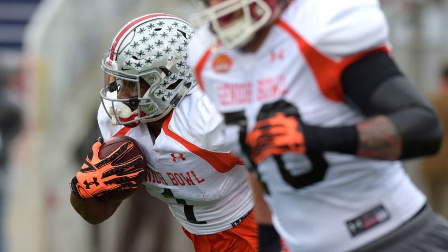 Jan 26, 2016; Mobile, AL, USA; North squad wide receiver Braxton Miller of Ohio State (1) runs the ball after a catch during Senior Bowl practice at Ladd-Peebles Stadium. Mandatory Credit: Glenn Andrews-USA TODAY Sports