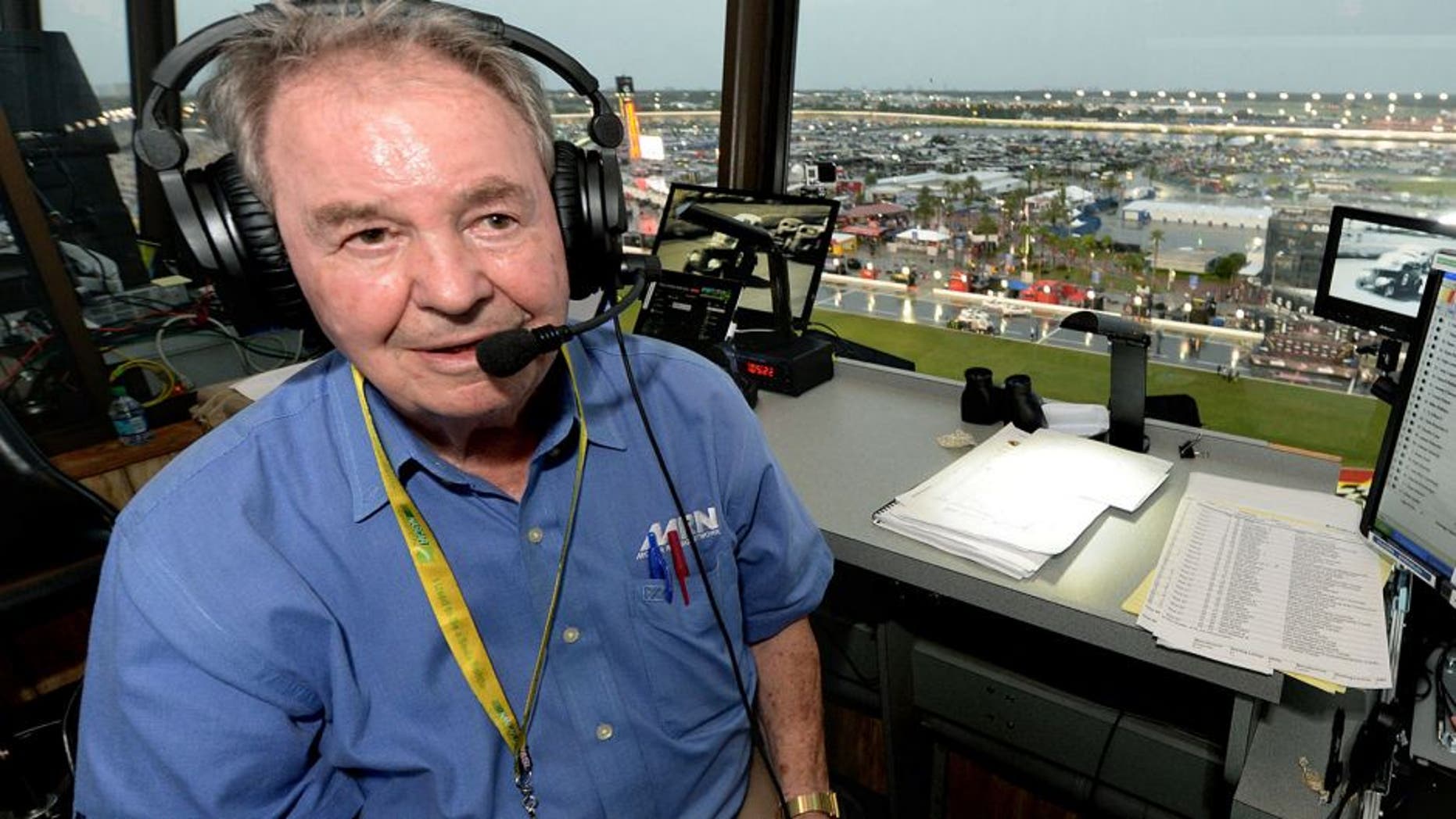 Jul 5, 2014; Daytona Beach, FL, USA; Motor Racing Network radio announcer Barney Hall pauses for a portrait in the radio booth during a rain delay for the Coke Zero 400 at Daytona International Speedway. With more than 50 years of calling races, the 82-year-old Hall will remain a vibrant part of Motor Racing Network broadcasts, but tonight s Coke Zero 400 will be his final as MRN s lead play-by-play announcer in the booth. Mandatory Credit: John David Mercer-USA TODAY Sports