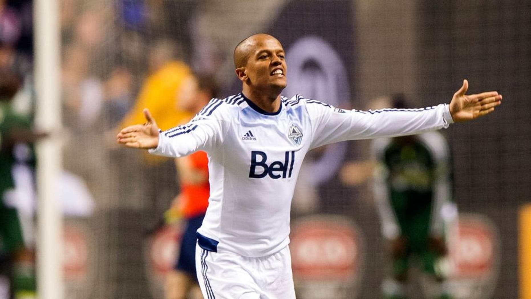VANCOUVER, BC - MARCH 28: Robert Earnshaw #88 of the Vancouver Whitecaps FC celebrates after defeating the Portland Timbers in MLS action on March 28, 2015 at BC Place Stadium in Vancouver, British Columbia, Canada. (Photo by Rich Lam/Getty Images)