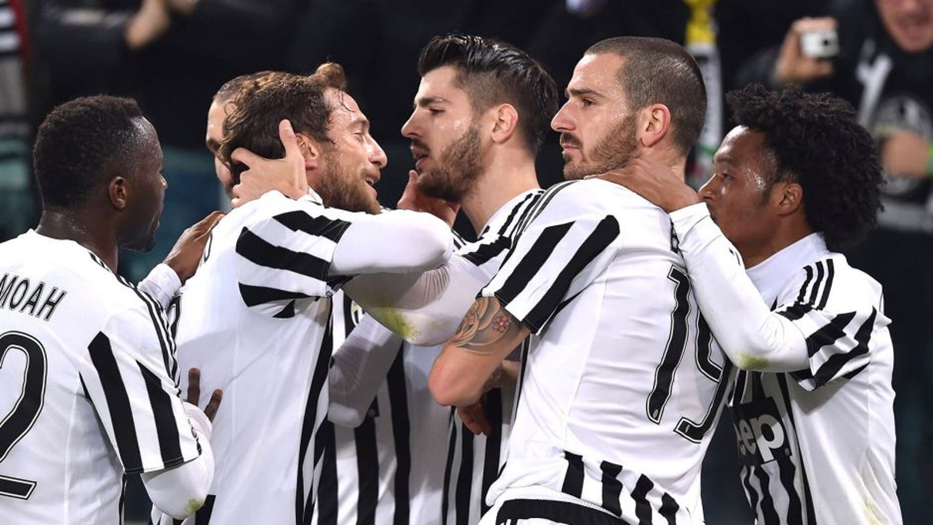 TURIN, ITALY - JANUARY 27: Alvaro Morata (C) of Juventus FC celebrates after scoring the opening goal from the penalty spot with team mates during the TIM Cup match between Juventus FC and FC Internazionale Milano at Juventus Arena on January 27, 2016 in Turin, Italy. (Photo by Valerio Pennicino/Getty Images )