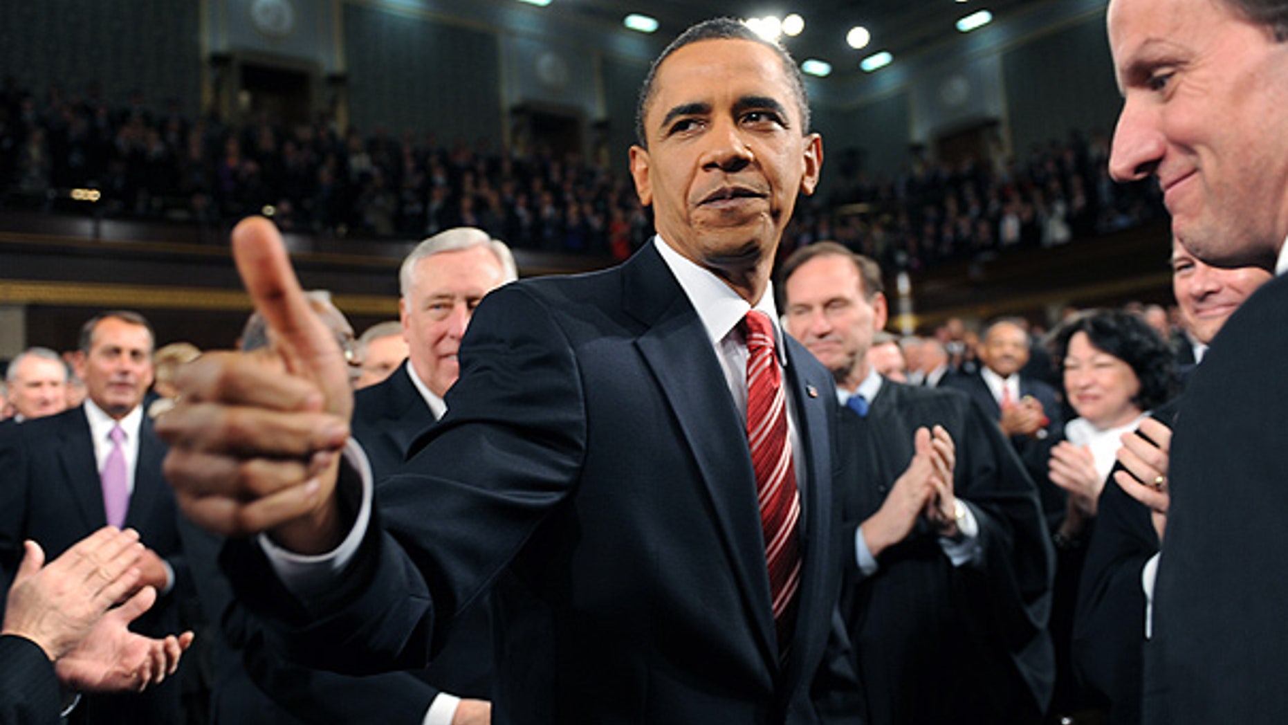 Jan. 27: President Obama greets members of Congress on his way to deliver the State of the Union.