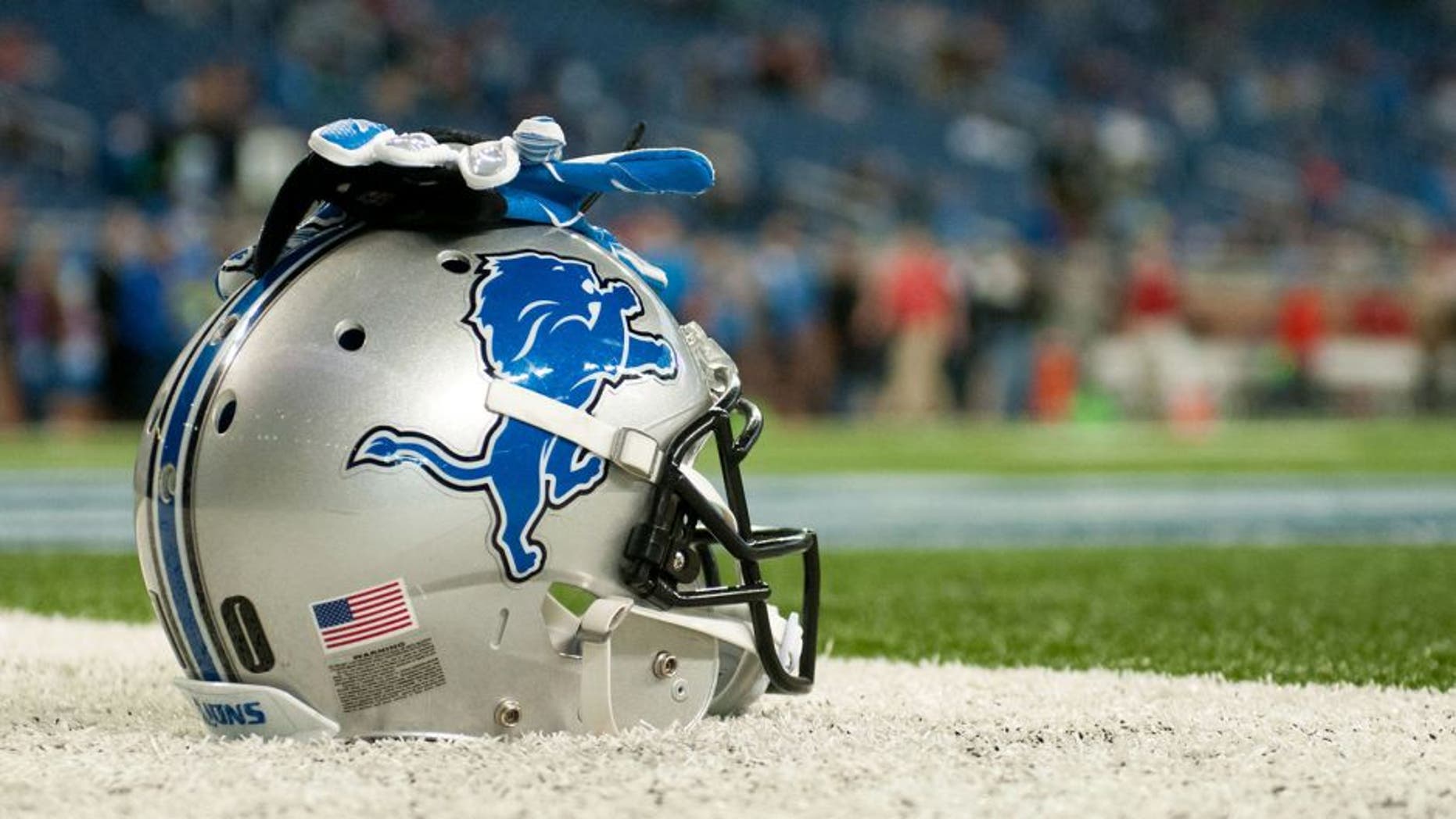 Dec 7, 2014; Detroit, MI, USA; A detailed view of a Detroit Lions helmet and gloves before the game against the Tampa Bay Buccaneers at Ford Field. Mandatory Credit: Tim Fuller-USA TODAY Sports