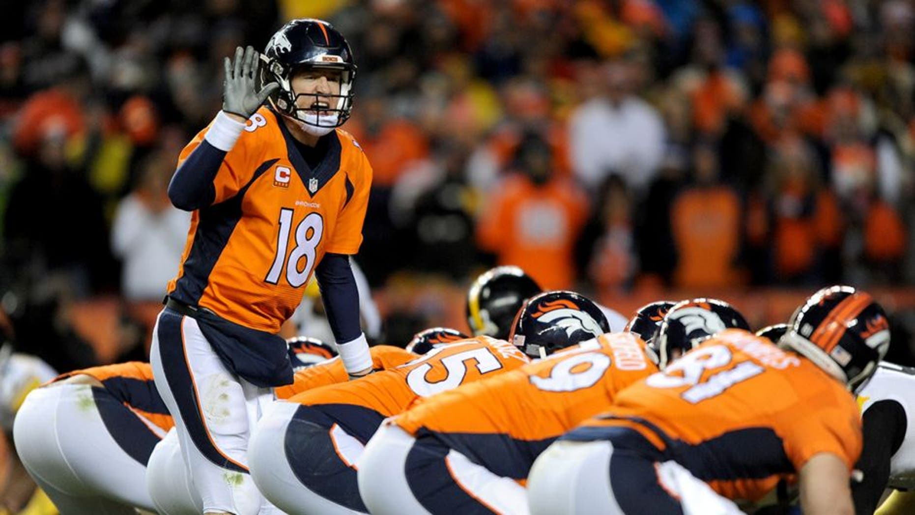 DENVER, CO - JANUARY 17: Peyton Manning #18 of the Denver Broncos calls a play against the Pittsburgh Steelers during the AFC Divisional Playoff Game at Sports Authority Field at Mile High on January 17, 2016 in Denver, Colorado. (Photo by Dustin Bradford/Getty Images)