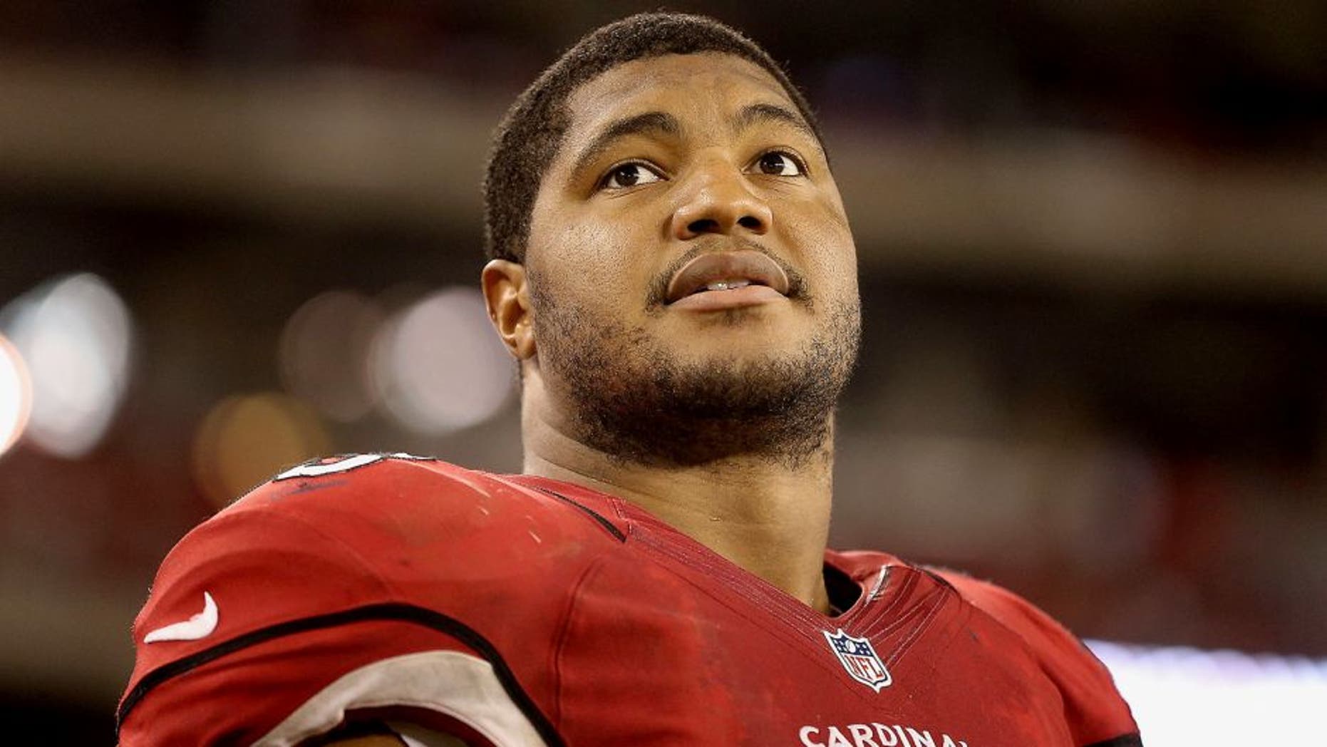 GLENDALE, AZ - AUGUST 24: Defensive end Calais Campbell #93 of the Arizona Cardinals watches from sidelines during the preseason NFL game against the San Diego Chargers at the University of Phoenix Stadium on August 24, 2013 in Glendale, Arizona. (Photo by Christian Petersen/Getty Images) *** Local Caption *** Calais Campbell