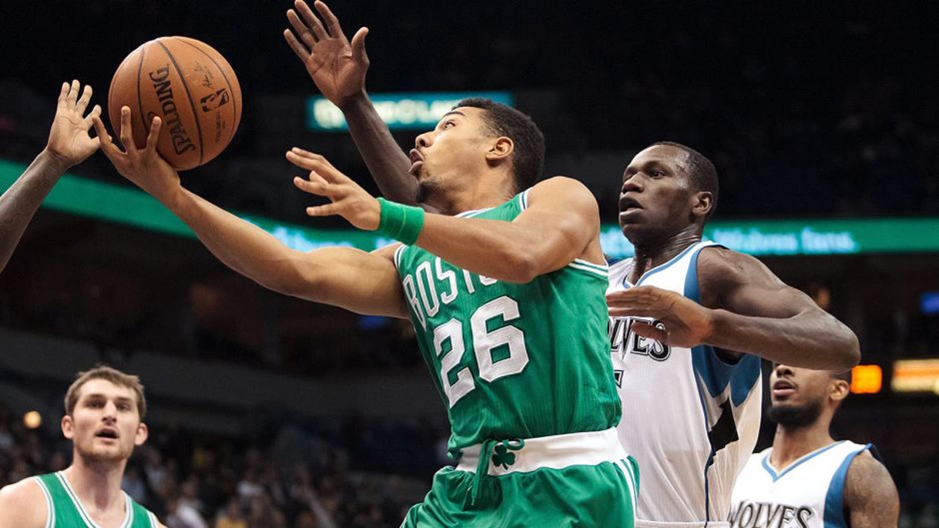 Jan 28, 2015; Minneapolis, MN, USA; Boston Celtics guard Phil Pressey (26) shoots in the third quarter against the Minnesota Timberwolves at Target Center. The Minnesota Timberwolves beat the Boston Celtics 110-98. Mandatory Credit: Brad Rempel-USA TODAY Sports