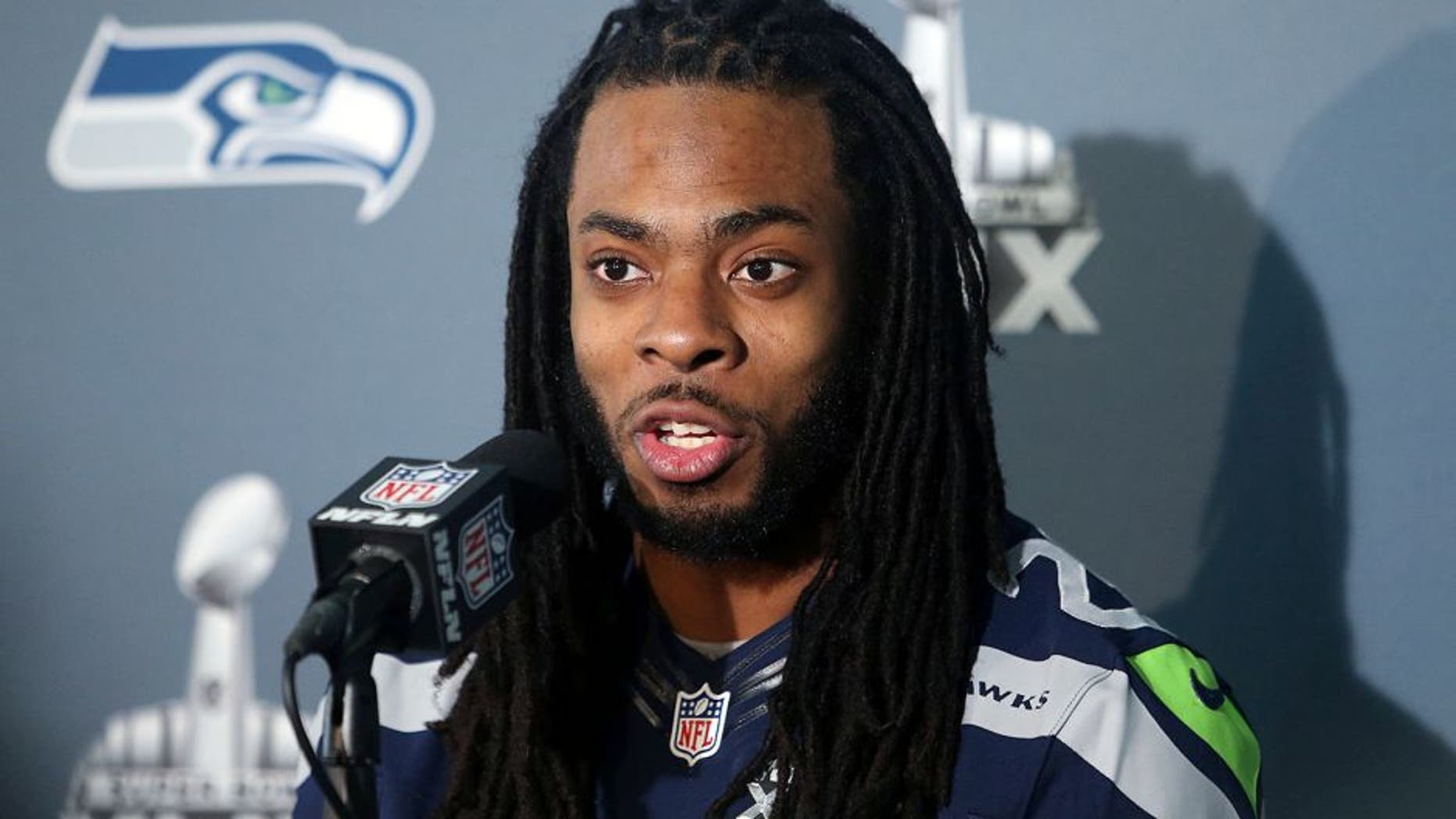 Jan 28, 2015; Phoenix, AZ, USA; Seattle Seahawks cornerback Richard Sherman talks to reporters during the Seattle Seahawks press conference at Arizona Grand. Mandatory Credit: Peter Casey-USA TODAY Sports
