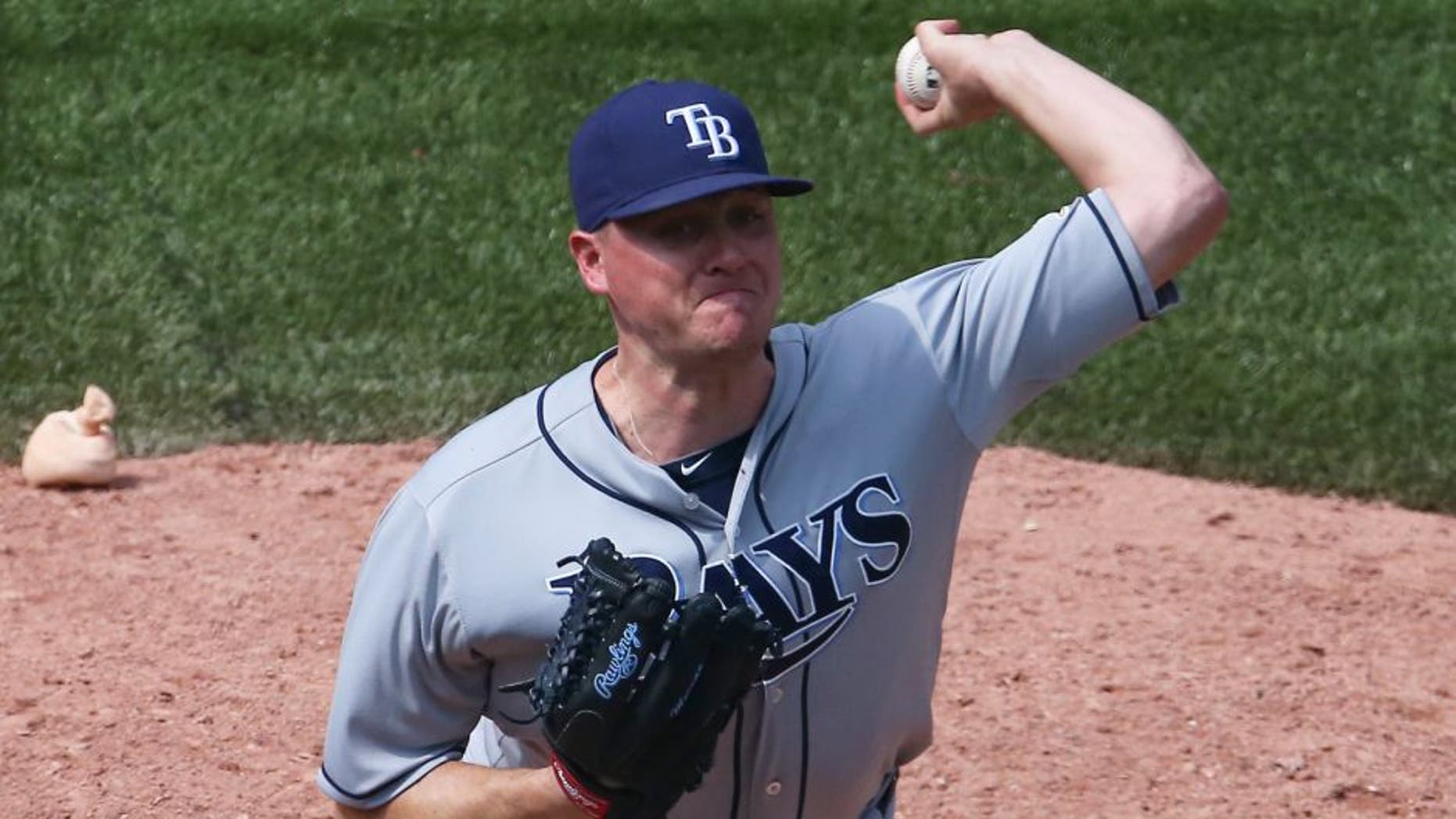 TORONTO, CANADA - JULY 18: Jake McGee #57 of the Tampa Bay Rays delivers a pitch in the ninth inning during MLB game action against the Toronto Blue Jays on July 18, 2015 at Rogers Centre in Toronto, Ontario, Canada. (Photo by Tom Szczerbowski/Getty Images)