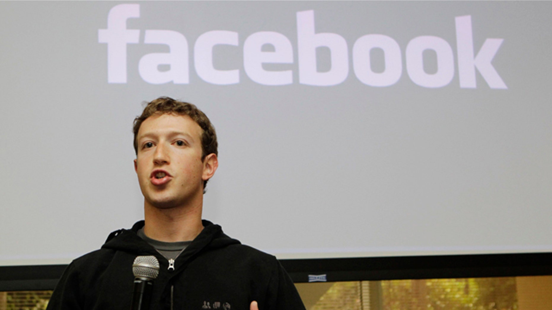 FILE - In this May, 26, 2010 file photo, Facebook CEO Mark Zuckerberg talks about the social network site's new privacy settings in Palo Alto, Calif.