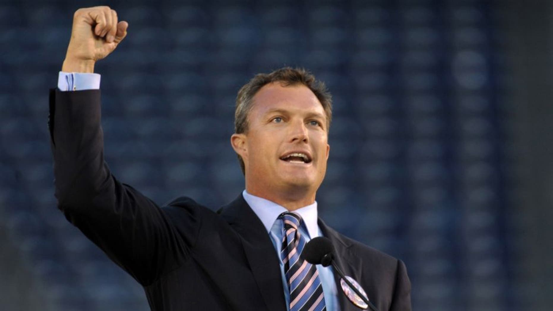 May 10, 2012; San Diego, CA, USA; Tampa Bay Buccaneers and Denver Broncos former safety John Lynch speaks at the Celebration of Life for Junior Seau at Qualcomm Stadium. Mandatory Credit: Kirby Lee/Image of Sport-USA TODAY Sports