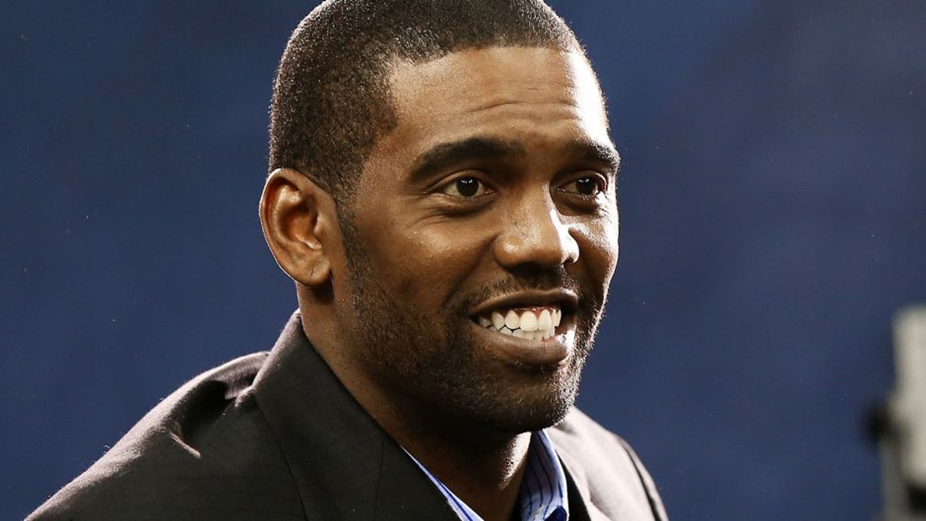 NEWARK, NJ - JANUARY 28: Former NFL player Randy Moss attends Super Bowl XLVIII Media Day at the Prudential Center on January 28, 2014 in Newark, New Jersey. Super Bowl XLVIII will be played between the Seattle Seahawks and the Denver Broncos on February 2. (Photo by Elsa/Getty Images)