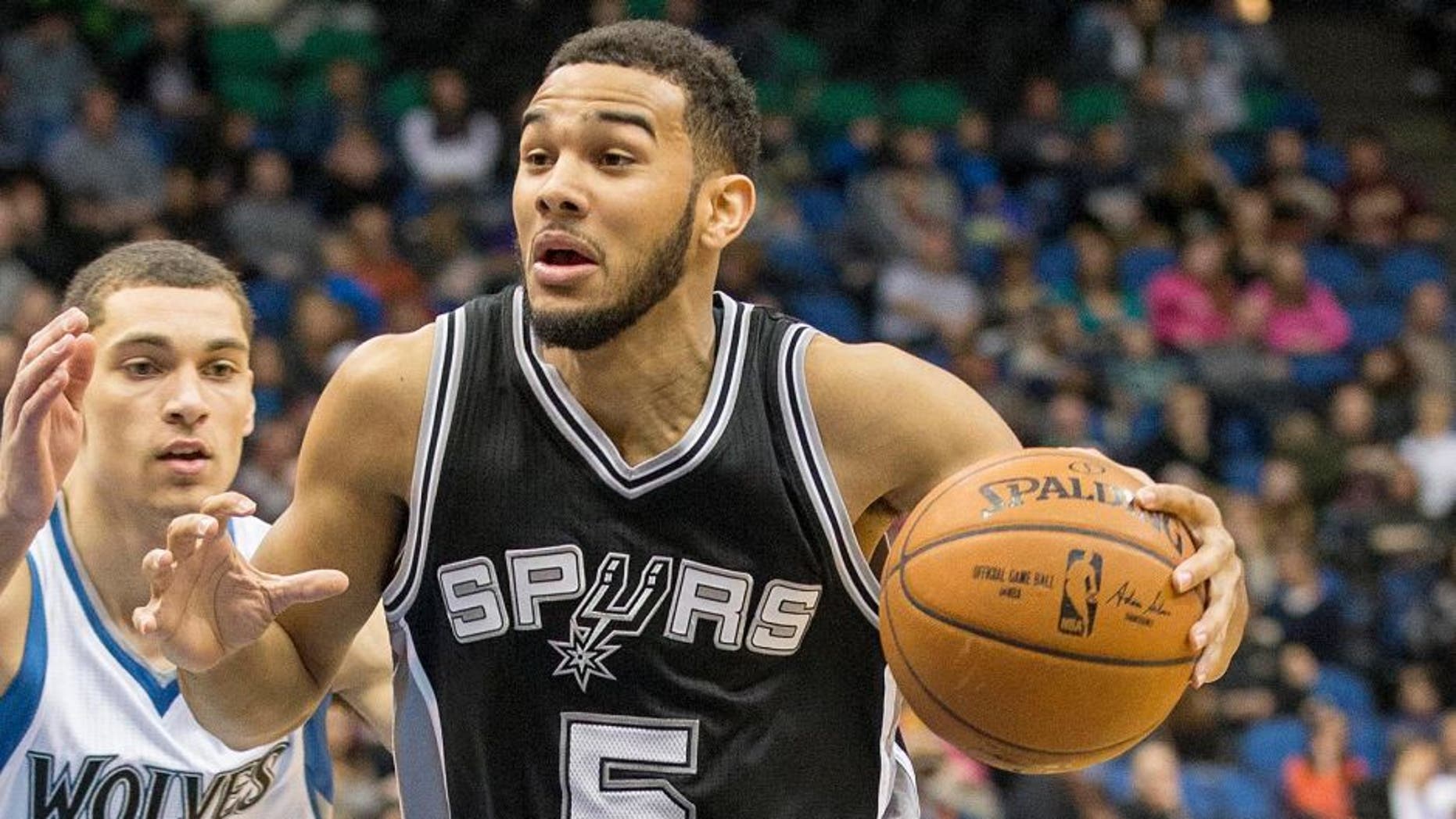 Jan 10, 2015; Minneapolis, MN, USA; San Antonio Spurs guard Cory Joseph (5) drives to the basket in the second half against the Minnesota Timberwolves at Target Center. The Spurs won 108-93. Mandatory Credit: Jesse Johnson-USA TODAY Sports