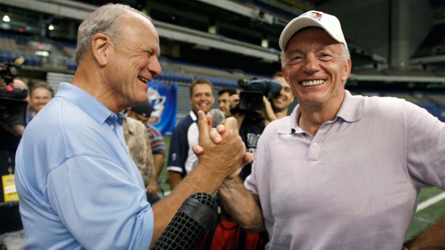 Former Cowboys coach Barry Switzer, left, laughs with Jerry Jones on the sideline at the end of drills at the Dallas Cowboys training camp in the San Antonio, Texas, Sunday, August 5, 2007. (Ron T. Ennis/Fort Worth Star-Telegram/MCT)