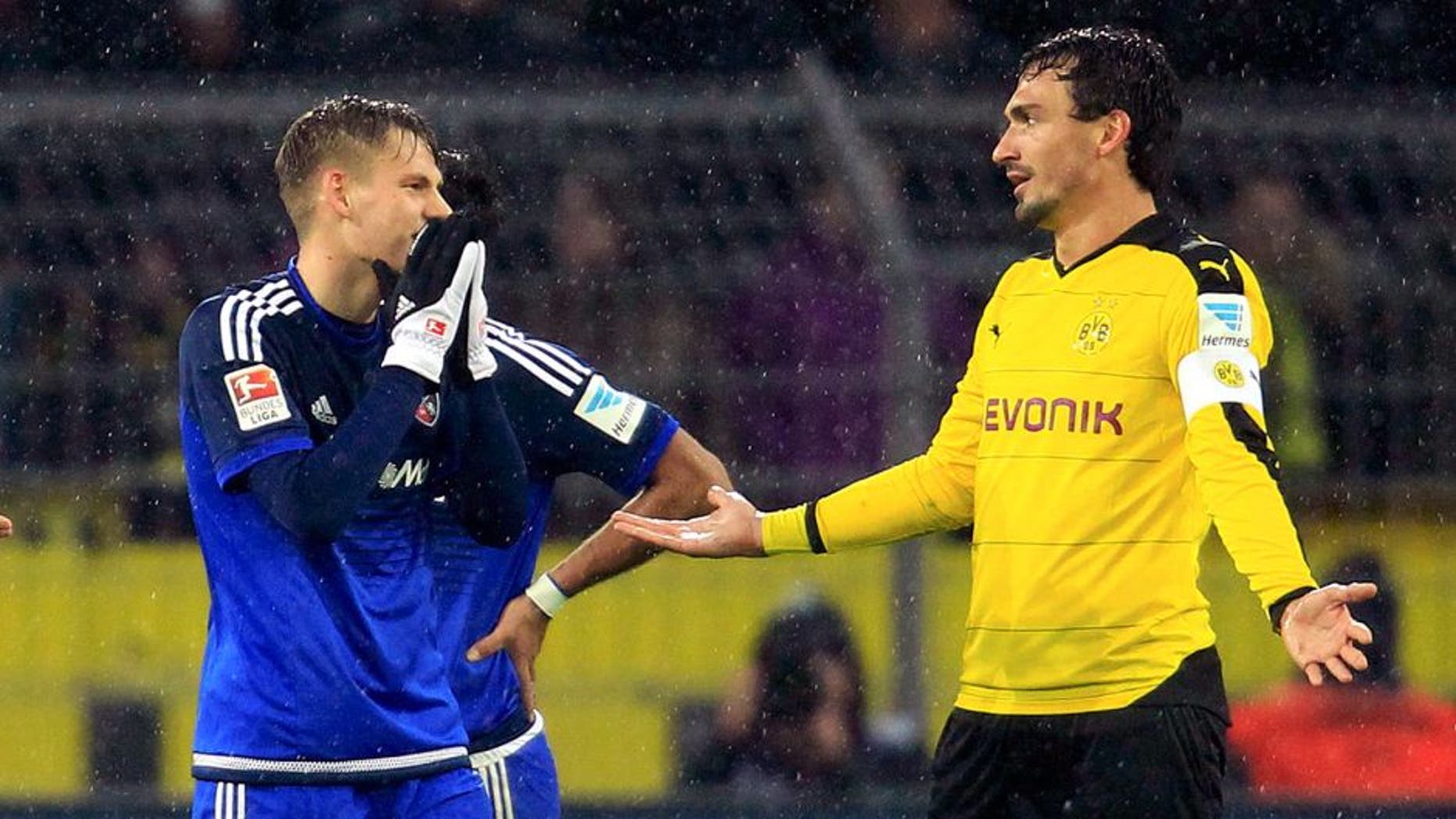 Football Soccer - Borussia Dortmund v FC Ingolstadt - German Bundesliga - Signal Iduna Park, Dortmund , 30/01/16FC Ingolstadt's Max Christiansen in action with Borussia Dortmund's Mats Hummels (R). REUTERS/Ina Fassbender DFL RULES TO LIMIT THE ONLINE USAGE DURING MATCH TIME TO 15 PICTURES PER GAME. IMAGE SEQUENCES TO SIMULATE VIDEO IS NOT ALLOWED AT ANY TIME. FOR FURTHER QUERIES PLEASE CONTACT DFL DIRECTLY AT + 49 69 650050 Picture Supplied by Action Images