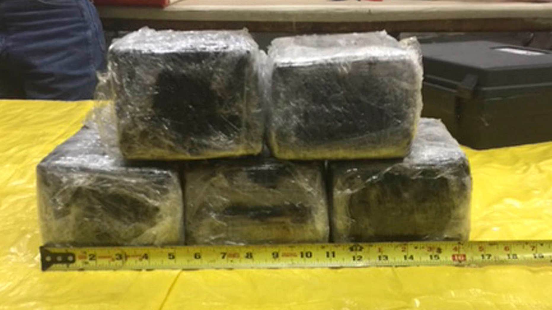 Jan. 30, 2017: This photo provided by the Tulsa County Sheriff's Office shows some of the 31 pounds of cocaine that was accidentally discovered stashed in the nose of an American Airlines aircraft in Tulsa, Okla.