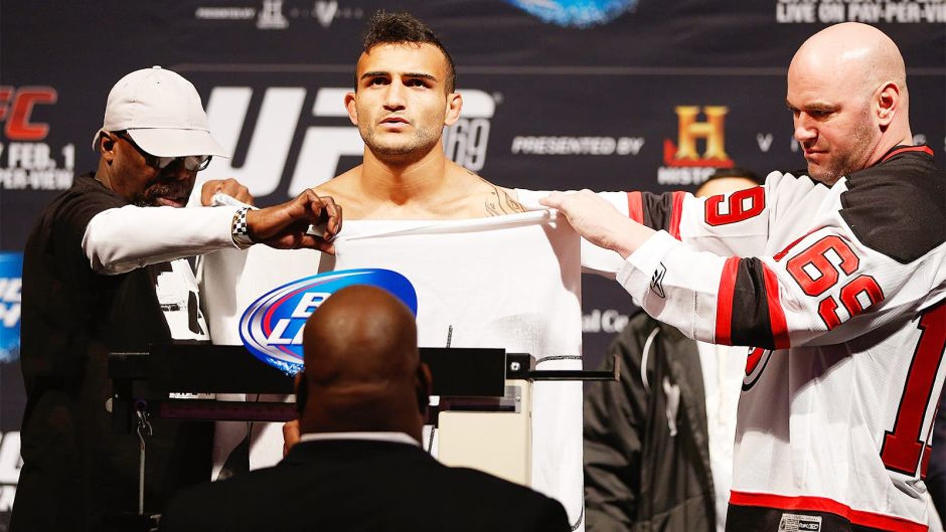 NEWARK, NJ - JANUARY 31: John Lineker fails to make weight during the UFC 169 weigh-in at the Prudential Center on January 31, 2014 in Newark, New Jersey. (Photo by Josh Hedges/Zuffa LLC/Zuffa LLC via Getty Images)