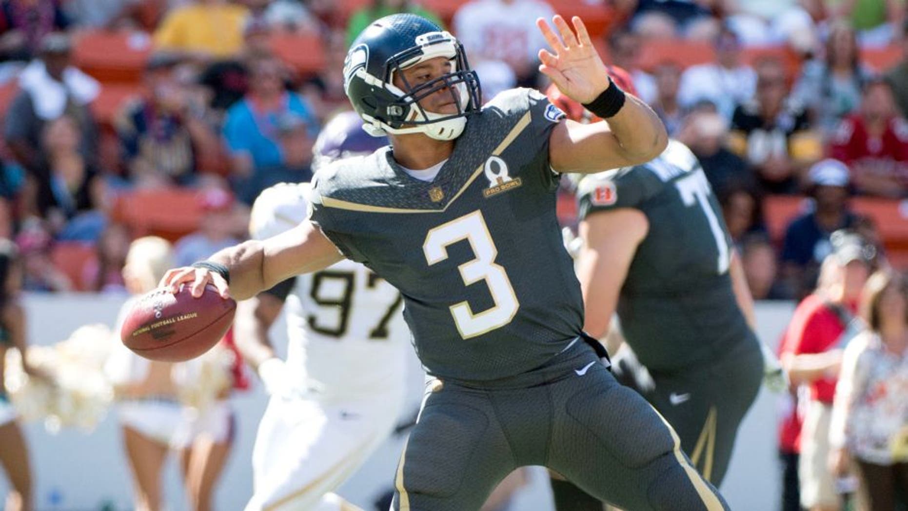 January 31, 2016; Honolulu, HI, USA; Team Irvin quarterback Russell Wilson of the Seattle Seahawks (3) passes the football against Team Rice during the first quarter of the 2016 Pro Bowl game at Aloha Stadium. Mandatory Credit: Kyle Terada-USA TODAY Sports