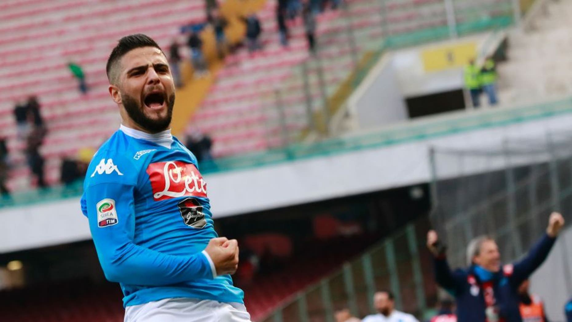 Napoli's Italian forward Lorenzo Insigne celebrates after scoring during the Italian Serie A football match SSC Napoli vs Empoli FC on January 31, 2016 at the San Paolo stadium in Naples. / AFP / CARLO HERMANN (Photo credit should read CARLO HERMANN/AFP/Getty Images)