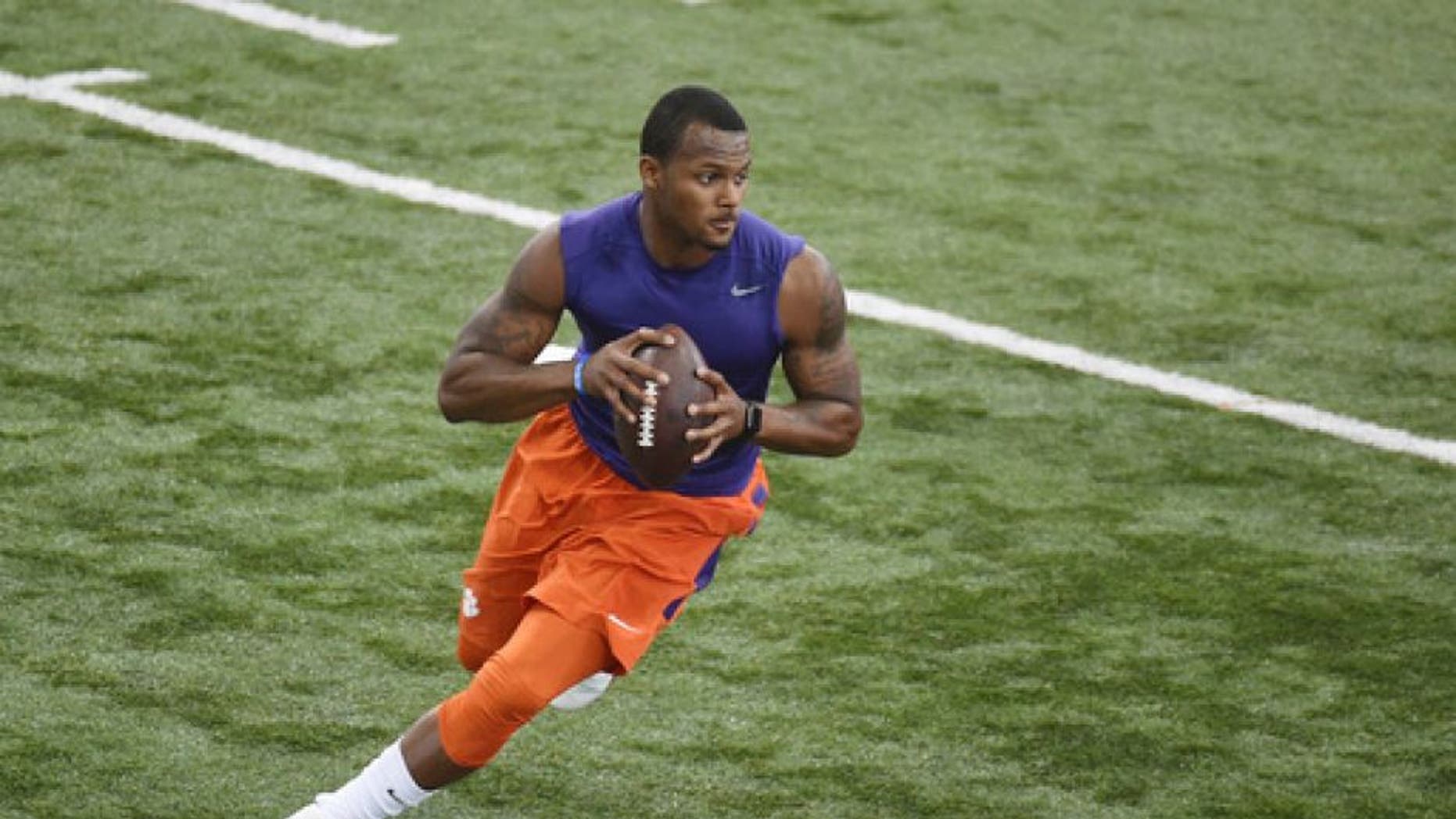 Deshawn Watson runs a drill during football pro day at Clemson University, Thursday, March 16, 2017, in Clemson, S.C. (AP Photo/Rainier Ehrhardt)