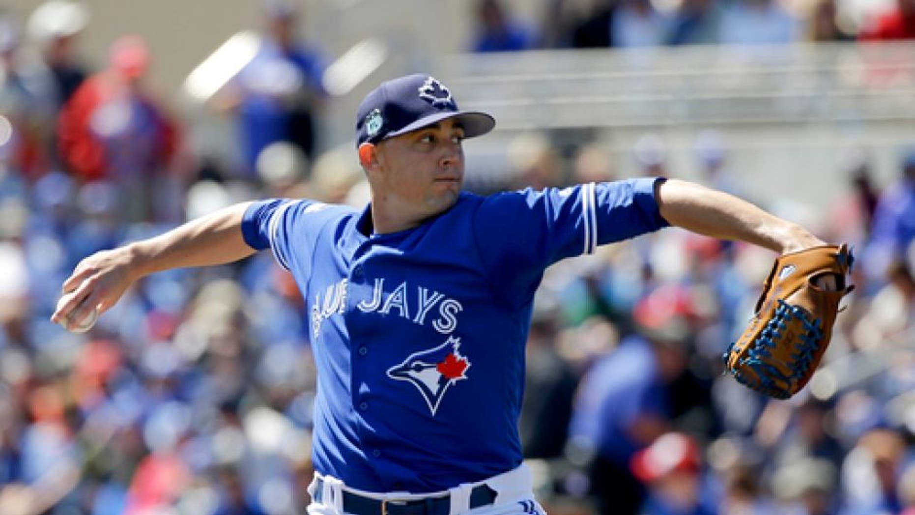 Toronto Blue Jays starting pitcher Aaron Sanchez throws in the first inning of a spring training baseball game against the New York Yankees, Thursday, March 16, 2017, in Dunedin, Fla. (AP Photo/John Raoux)
