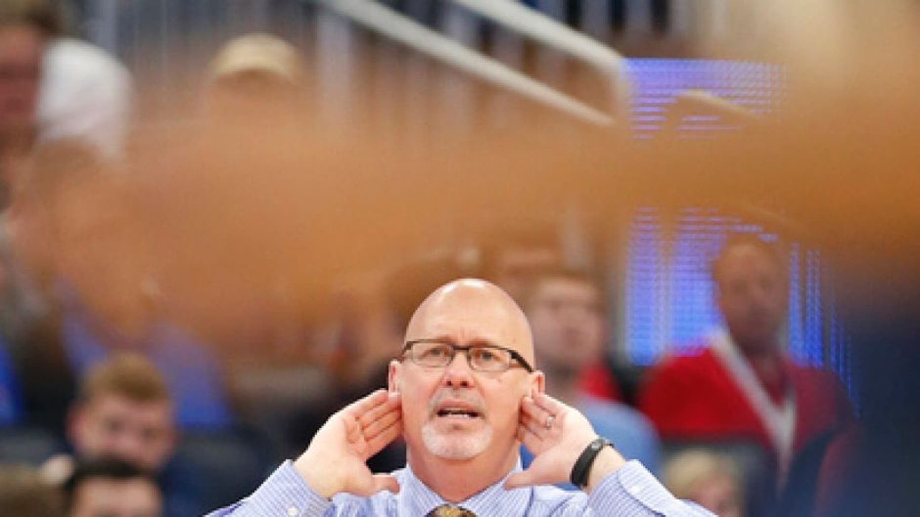 East Tennessee State head coach Steve Forbes calls out a play during the first half of a first-round men's college basketball game against Florida in the NCAA Tournament, Thursday, March 16, 2017, in Orlando, Fla. (AP Photo/Wilfredo Lee)