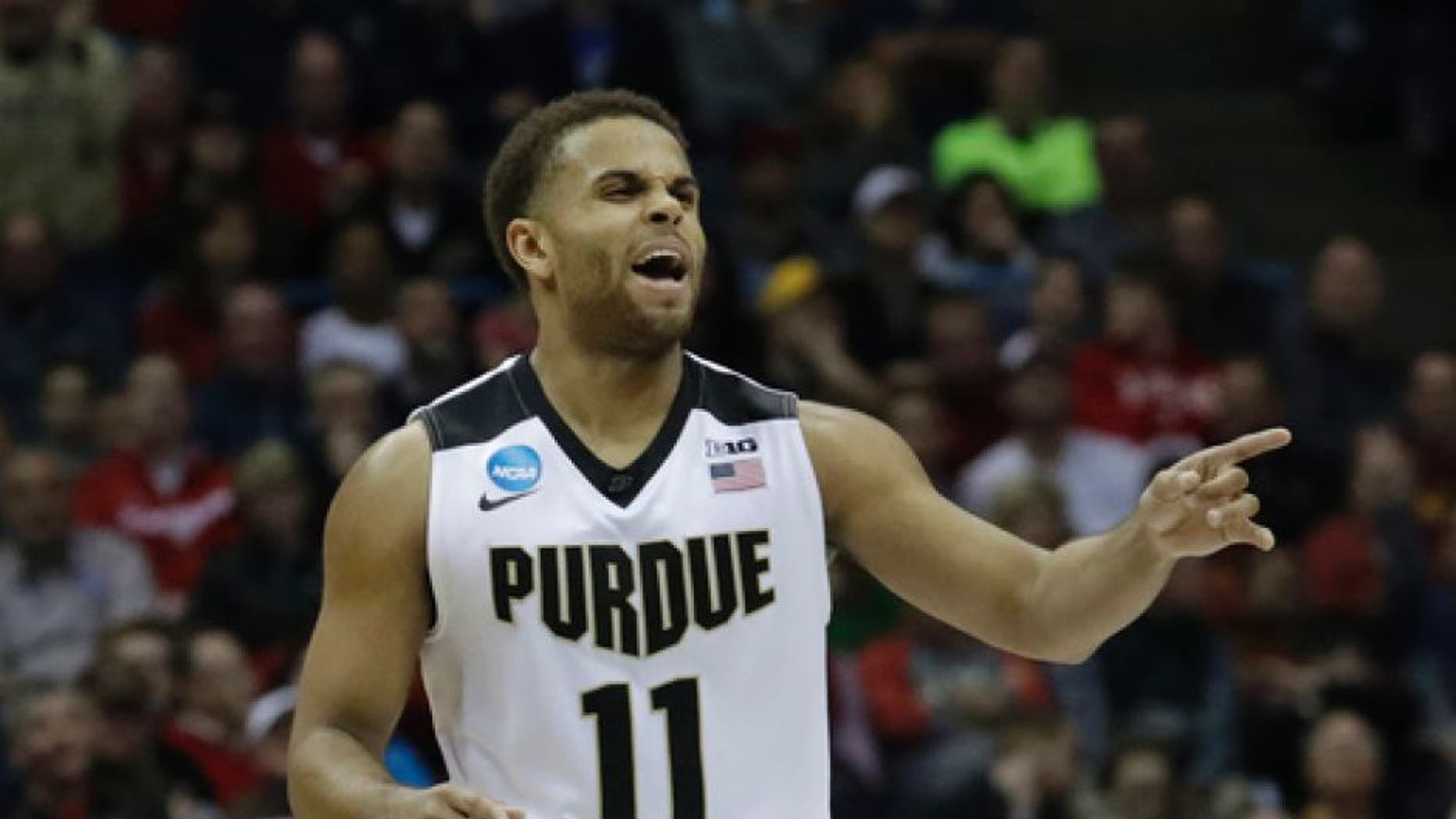 Purdue's P.J. Thompson celebrates during the second half of an NCAA college basketball tournament first-round game against Vermont Thursday, March 16, 2017, in Milwaukee. Purdue won 80-70. (AP Photo/Morry Gash)