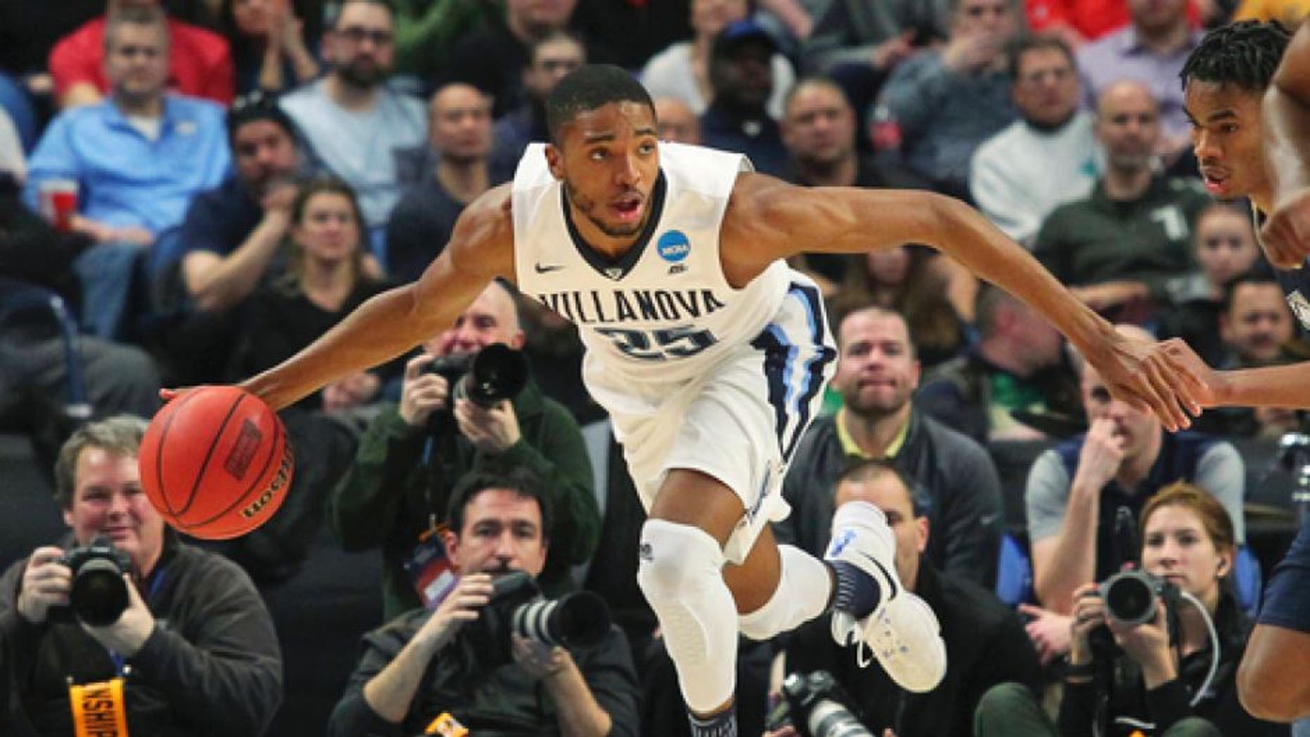 Villanova guard Mikal Bridges (25) handles the ball during the second half of a first-round men's college basketball game against Mount St. Mary's in the NCAA Tournament, Thursday, March 16, 2017, in Buffalo, N.Y. Villanova won, 76-56. (AP Photo/Bill Wippert)