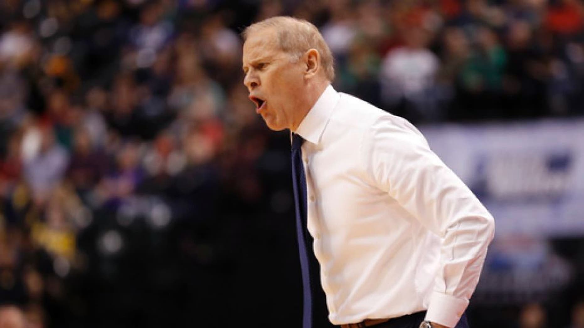 Michigan head coach John Beilein is seen on the sidelines during the first half of a first-round game against Oklahoma State in the men's NCAA college basketball tournament Friday, March 17, 2017, in Indianapolis, Mo. (AP Photo/Jeff Roberson)