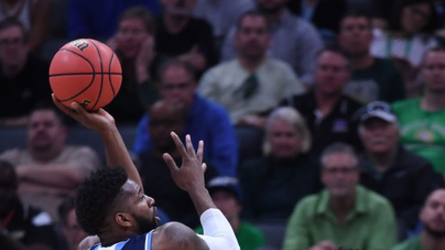 SACRAMENTO, CA - MARCH 17: Hassan Martin #12 of the Rhode Island Rams attempts a shot against the Creighton Bluejays during the first round of the 2017 NCAA Men's Basketball Tournament at Golden 1 Center on March 17, 2017 in Sacramento, California. (Photo by Thearon W. Henderson/Getty Images)