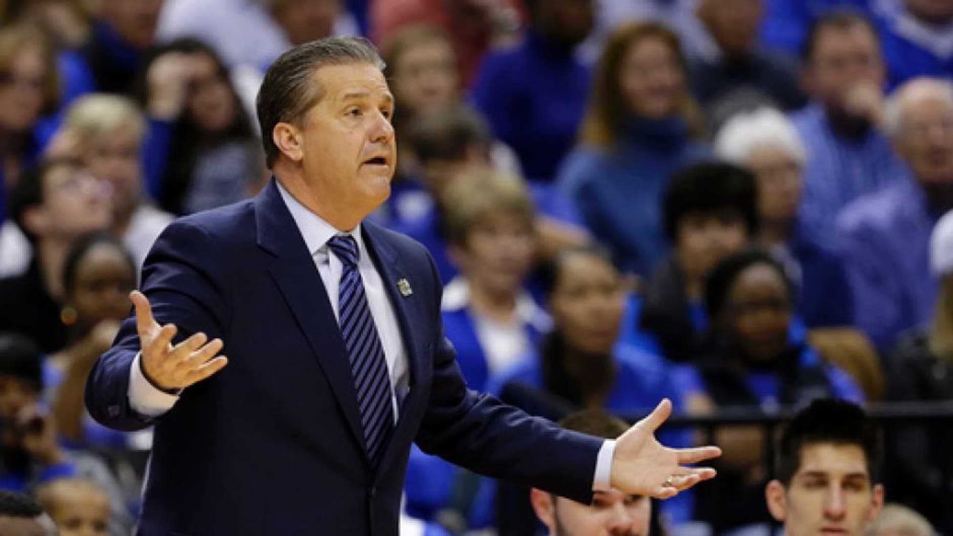 Kentucky head coach John Calipari questions a call during the first half of a second-round game against Wichita State in the mens NCAA college basketball tournament in Indianapolis, Sunday, March 19, 2017. (AP Photo/Michael Conroy)