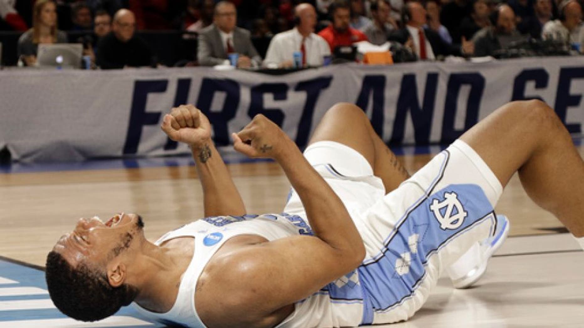 North Carolina's Kennedy Meeks celebrates during the second half in a second-round game against Arkansas in the NCAA men's college basketball tournament in Greenville, S.C., Sunday, March 19, 2017. (AP Photo/Chuck Burton)