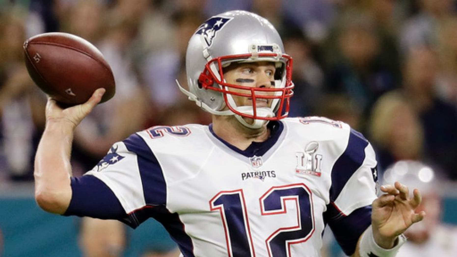 FILE - In this Feb. 5, 2017 file photo, New England Patriots quarterback Tom Brady prepares to pass against the Atlanta Falcons during the first half of the NFL Super Bowl 51 football game in Houston. Tom Brady's missing jersey from the Super Bowl has been found in the possession of a member of the international media. The NFL said in a statement Monday, March 20, 2017, that his jersey was found through the "cooperation of the NFL and New England Patriots' security teams, the FBI and other law enforcement authorities." (AP Photo/Eric Gay, File)
