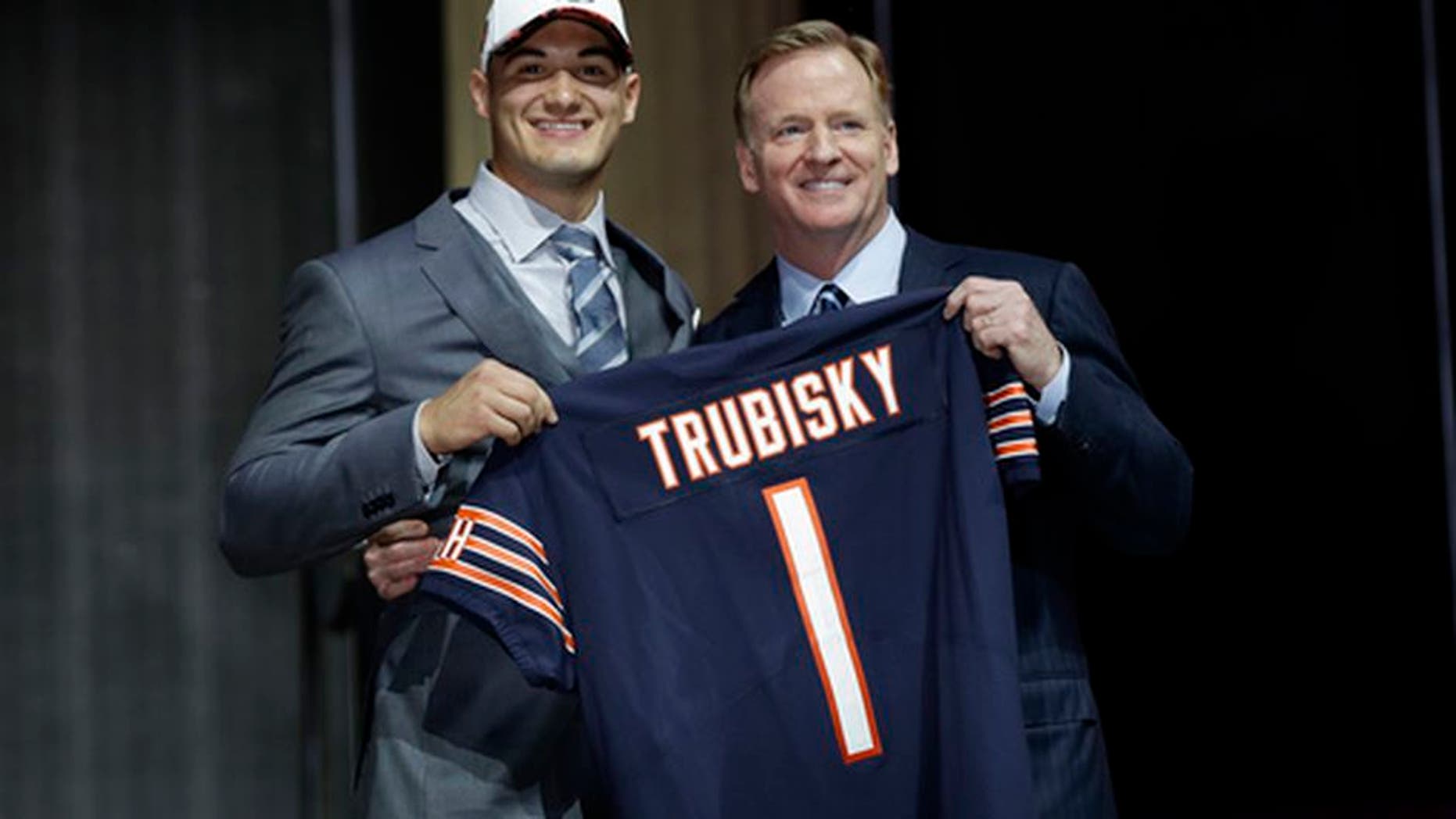 North Carolina's Mitch Trubisky, left, poses with NFL commissioner Roger Goodell after being selected by the Chicago Bears during the first round of the 2017 NFL football draft, Thursday, April 27, 2017, in Philadelphia. (AP Photo/Matt Rourke)