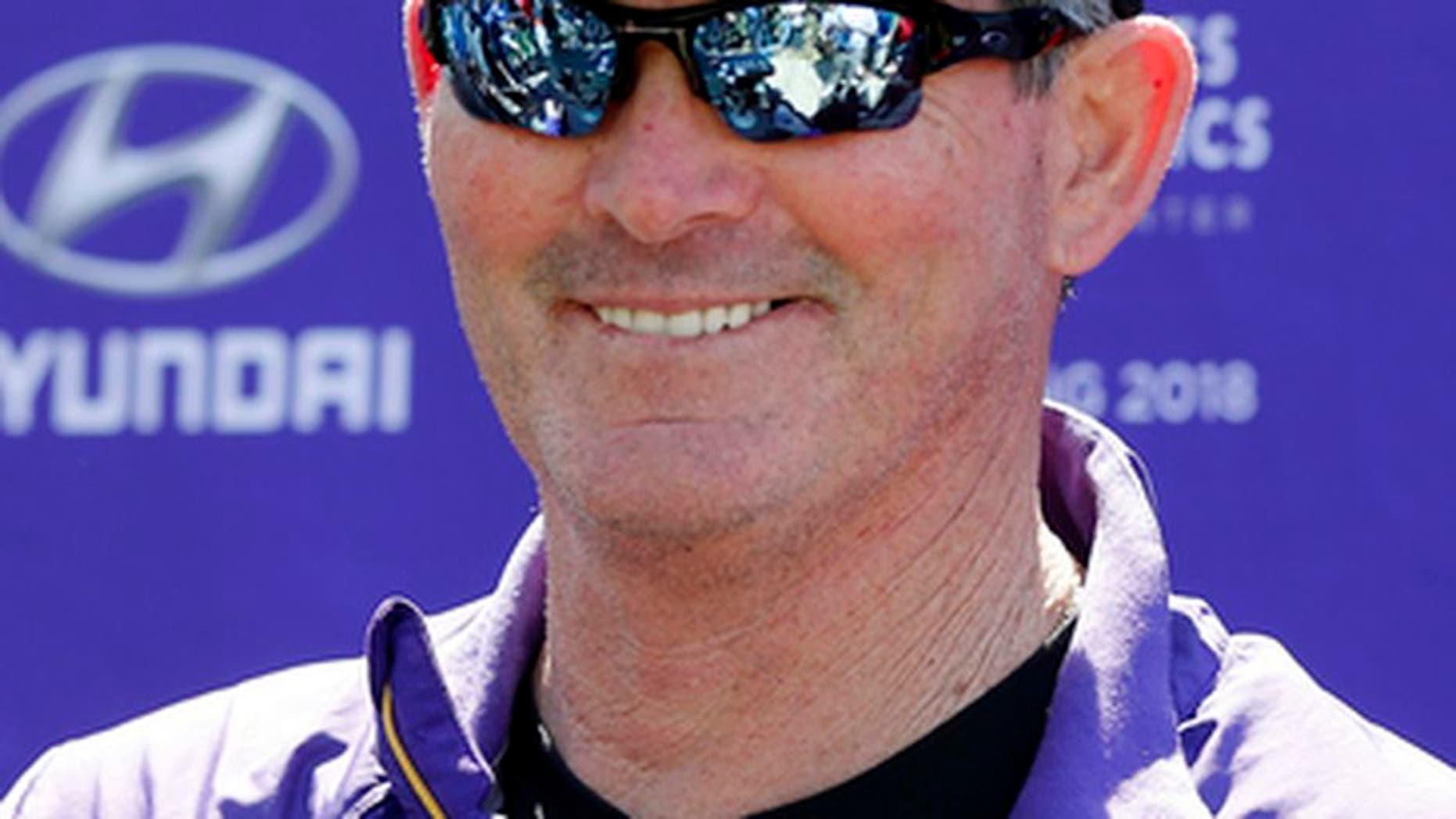 Minnesota Vikings head coach Mike Zimmer smiles in response to a question during the NFL football team's rookies minicamp Friday, May 5, 2017, in Eden Prairie, Minn. (AP Photo/Jim Mone)