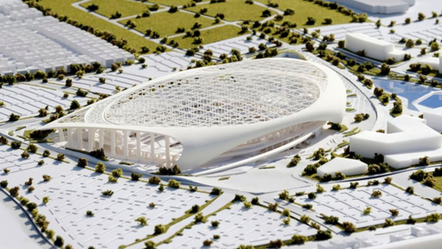 A three-dimensional model of the new Los Angeles Rams stadium is on display during the groundbreaking for the team's new stadium and entertainment district in Inglewood, Calif. on Thursday, Nov. 17, 2016. The project will cost more than $2 billion and is expected to open in August 2019 before hosting the Super Bowl 18 months later. (AP Photo/Richard Vogel)