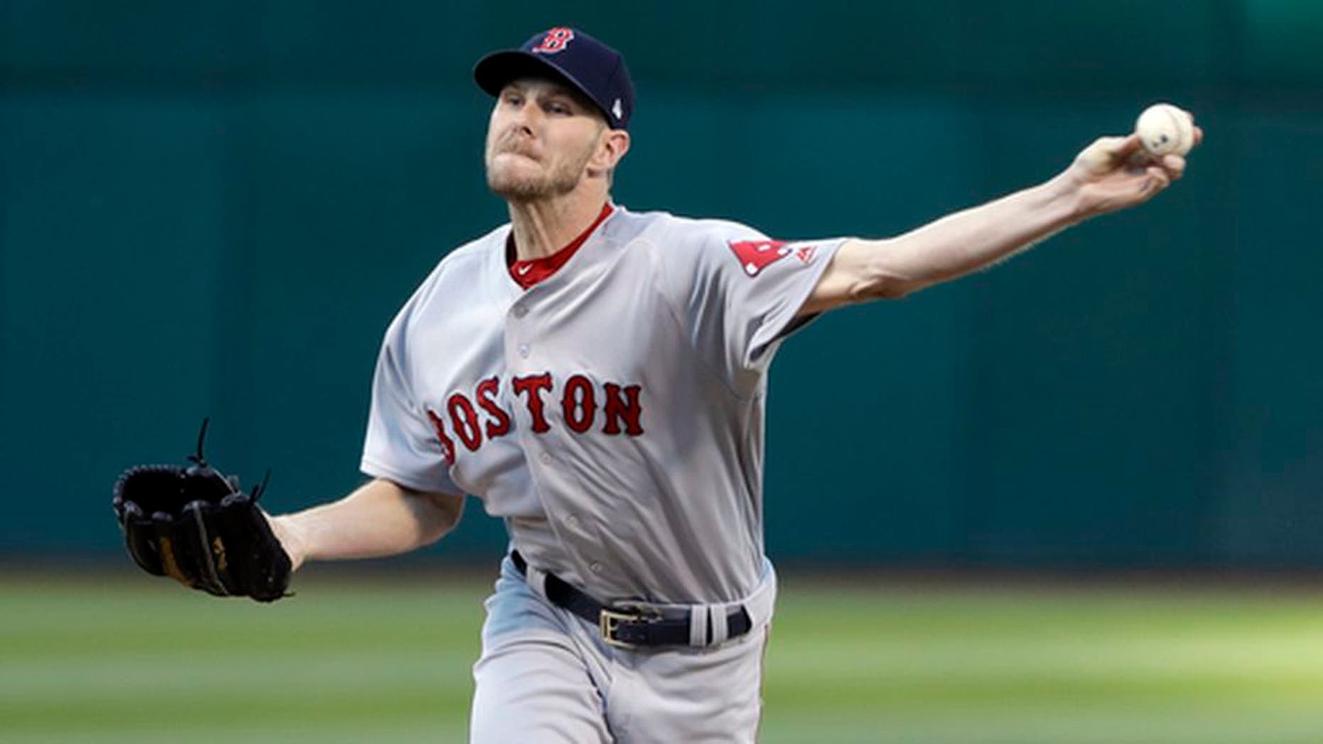Boston Red Sox starting pitcher Chris Sale throws to the Oakland Athletics during the first inning of a baseball game Friday, May 19, 2017, in Oakland, Calif. (AP Photo/Marcio Jose Sanchez)