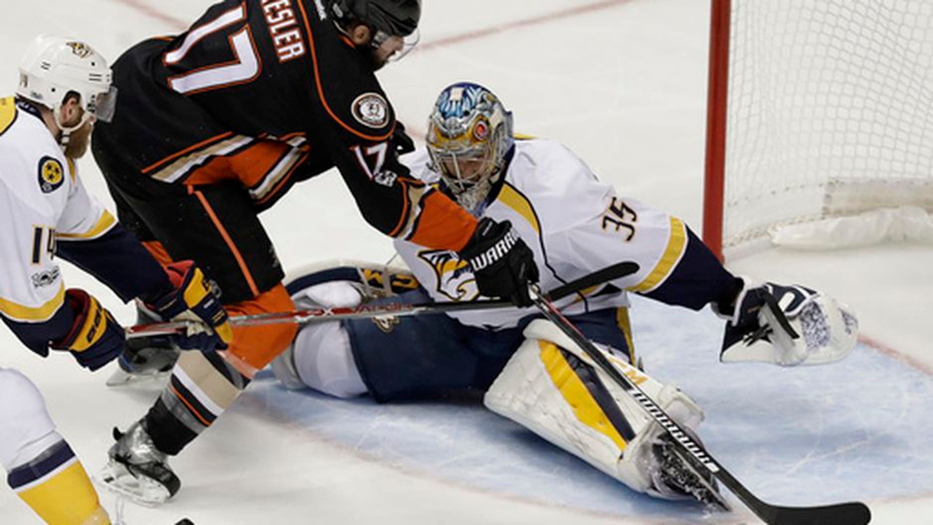Anaheim Ducks center Ryan Kesler misses a shot against Nashville Predators goalie Pekka Rinne during the first period of Game 5 in the NHL hockey Stanley Cup Western Conference finals in Anaheim, Calif., Saturday, May 20, 2017. (AP Photo/Chris Carlson)