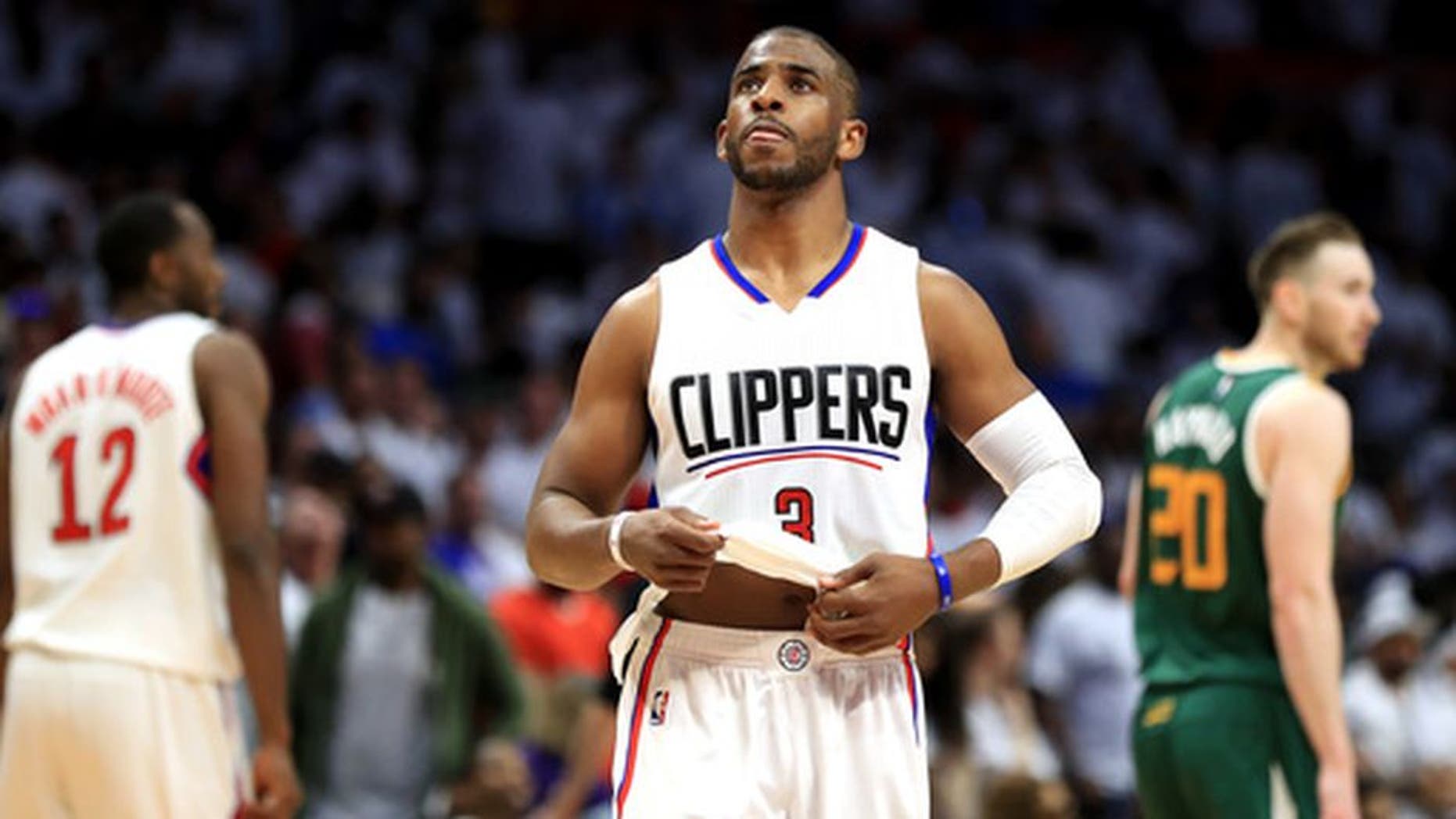 LOS ANGELES, CA - APRIL 30: Chris Paul #3 of the Los Angeles Clippers looks on during the second half of Game Seven of the Western Conference Quarterfinals against the Utah Jazz at Staples Center at Staples Center on April 30, 2017 in Los Angeles, California. NOTE TO USER: User expressly acknowledges and agrees that, by downloading and or using this photograph, User is consenting to the terms and conditions of the Getty Images License Agreement. (Photo by Sean M. Haffey/Getty Images)