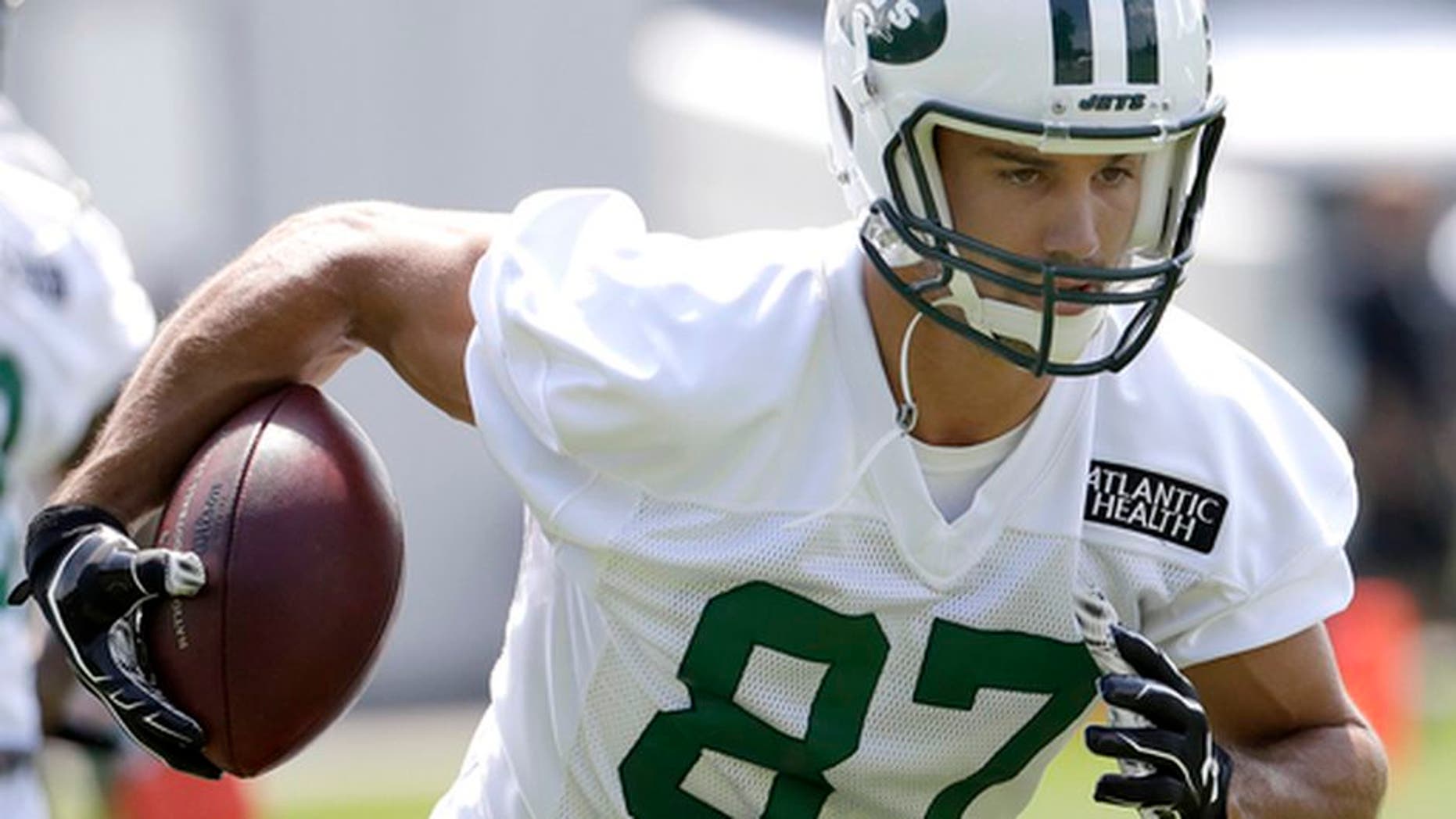 FILE - In this Thursday, July 28, 2016 file photo, New York Jets wide receiver Eric Decker runs a drill during NFL football training camp in Florham Park, N.J. The New York Jets are planning to trade or cut wide receiver Eric Decker, the latest move in what has been an offseason purge of veterans with big contracts. General manager Mike Maccagnan says Tuesday night, June 6, 2017 that if the Jets cant deal Decker, they will move forward without him. (AP Photo/Julio Cortez, File)