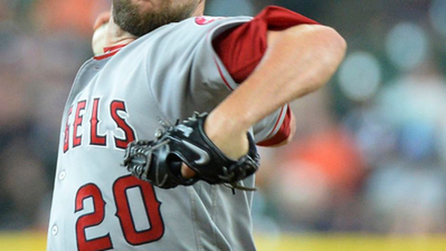 FILE - In this Thursday, April 20, 2017 file photo, Los Angeles Angels reliever Bud Norris pitches against the Houston Astros in a baseball game in Houston. Angels closer Bud Norris has been placed on the 10-day disabled list because of right knee inflammation, Tuesday, June 20, 2017. (AP Photo/George Bridges, File)