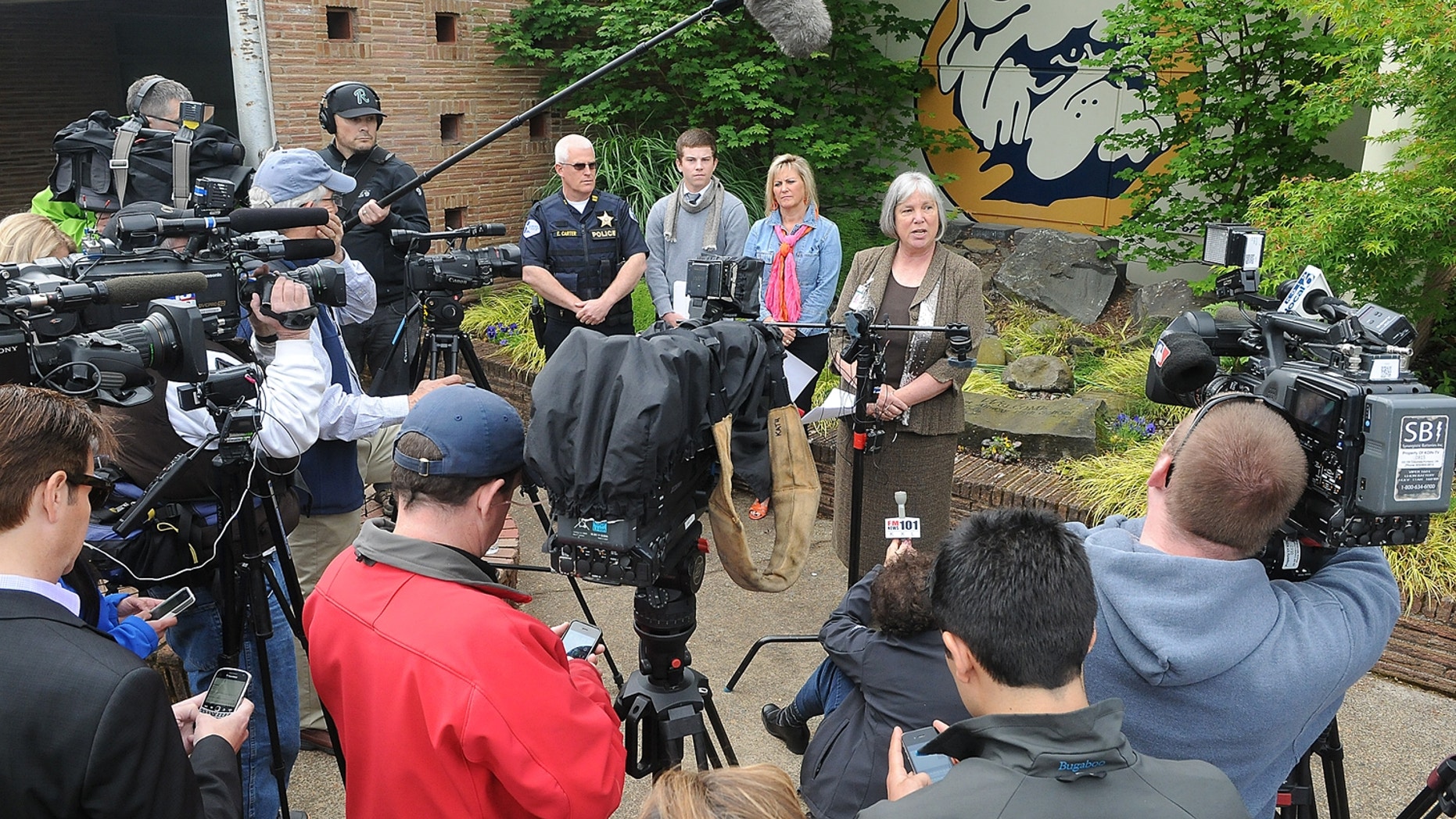 Greater Albany School Superintendent Maria Delapoer talks to the media at a press conference in front of West Albany High School, Tuesday, May 28, 2013 after a 17-year-old was arrested and charged with plotting to blow up the school. (AP Photo/Democrat-Herald, Mark Ylen)