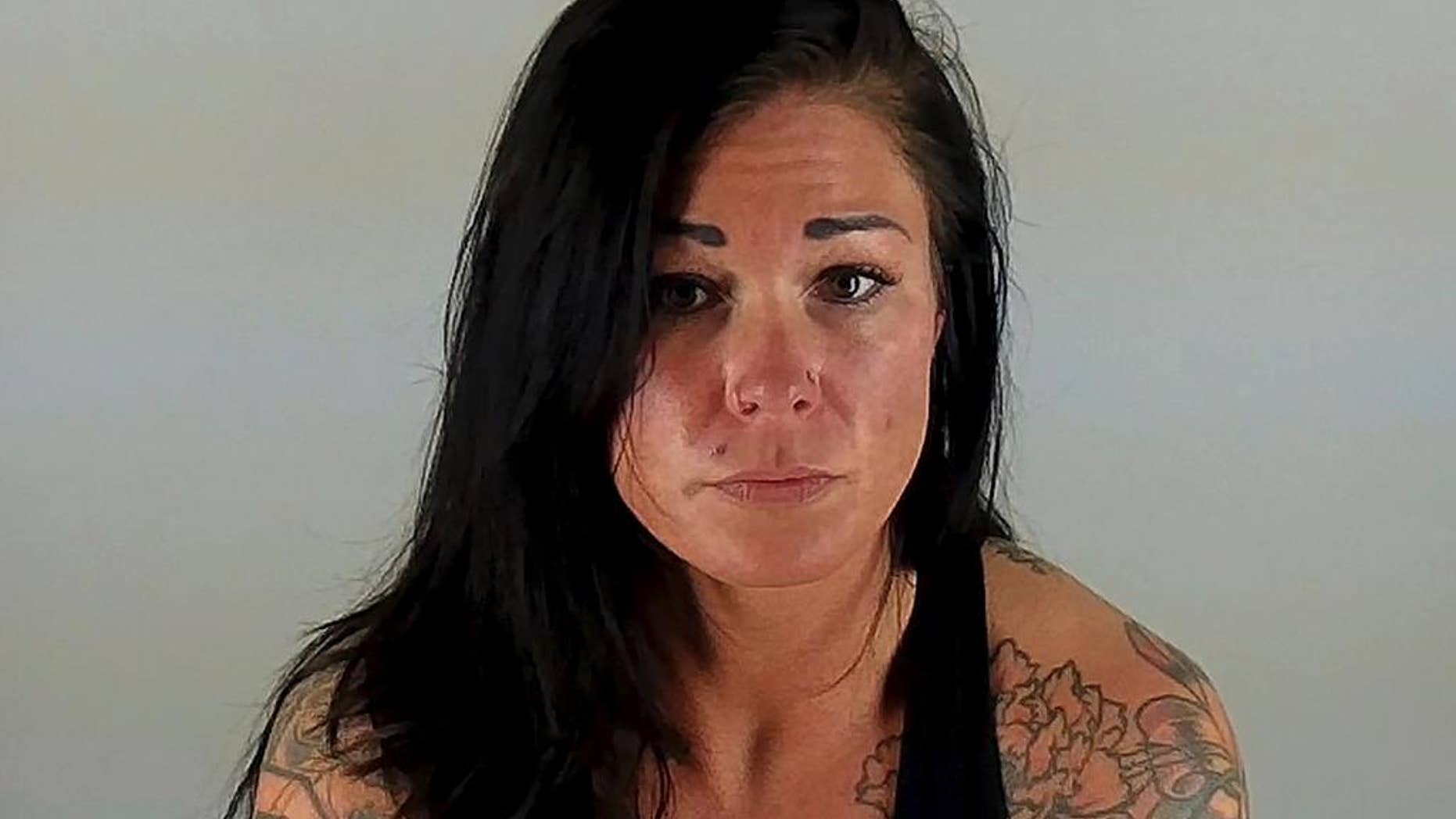 This undated photo provided by the Deschutes County Sheriff's office shows January Neatherlin. A Deschutes County grand jury returned an indictment in Bend, Ore., Tuesday, March 21, 2017, charging Neatherlin with more than 100 criminal charges related to a babysitting business she operated in Bend. Neatherlin is alleged to have, on numerous occasions, left the 2-7 kids in her care, who ranged in ages from 6 months to 4 years old, alone in her house when she went to the gym and tanning salon. (Deschutes County Sheriff's Office via AP)