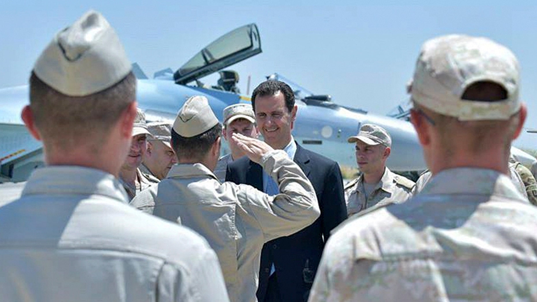 Syria's President Bashar al-Assad visits a Russian air base at Hmeymim, in western Syria in this handout picture posted on SANA on June 27, 2017, Syria.