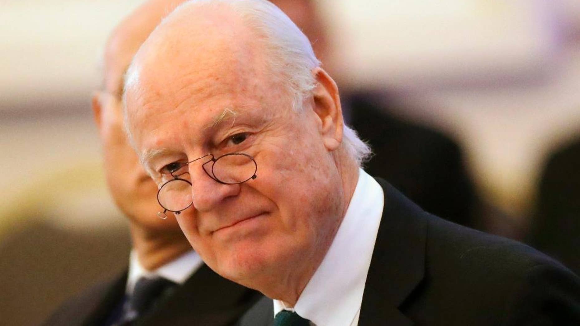 FILE -- In this Jan. 23, 2017 file photo, U.N. Special Envoy for Syria Staffan de Mistura arrives to attend the talks on Syrian peace in Astana, Kazakhstan. Chief of staff to de Mistura, Michael Contet, said Tuesday, Feb. 21, 2017, that their "main guidance" for the first intra-Syrian peace talks in 10 months will be a Security Council resolution that calls for political transition. Contet said that de Mistura is putting the "finishing touches on arrangements" for Thursday's start of talks in Geneva between government and opposition delegations, the fourth round since early last year. (AP Photo/Sergei Grits, File)