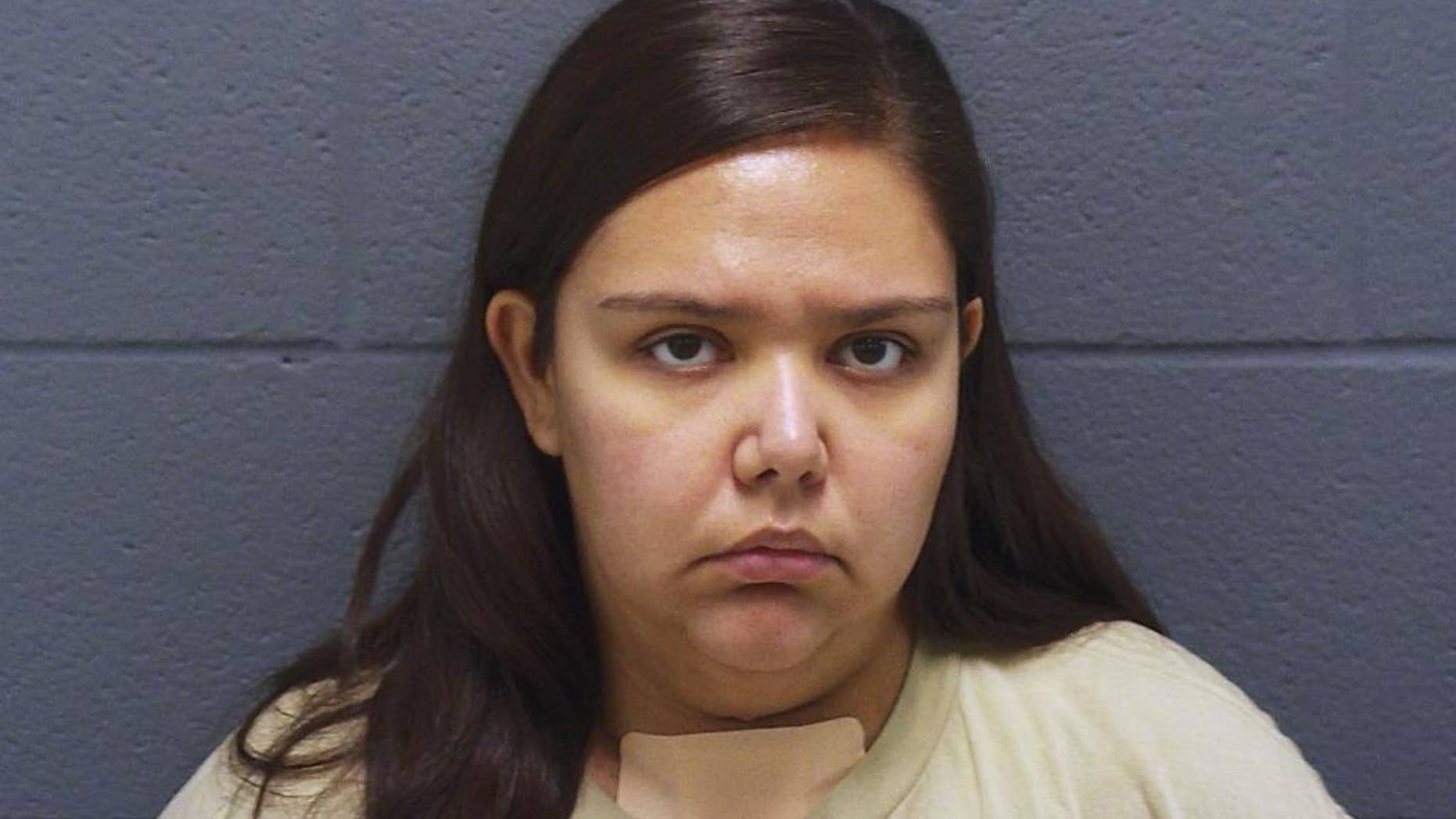 This undated photo provided by the Montgomery County Sheriff's Office in Crawfordsville, Ind., shows Brandi Worley, of Darlington, Ind. Worley, who has been charged with murder in the stabbing deaths her young son and daughter Nov. 17, 2016, has been released from a hospital and was booked into jail Monday, Nov. 28. (Montgomery County Sheriff's Office via AP)