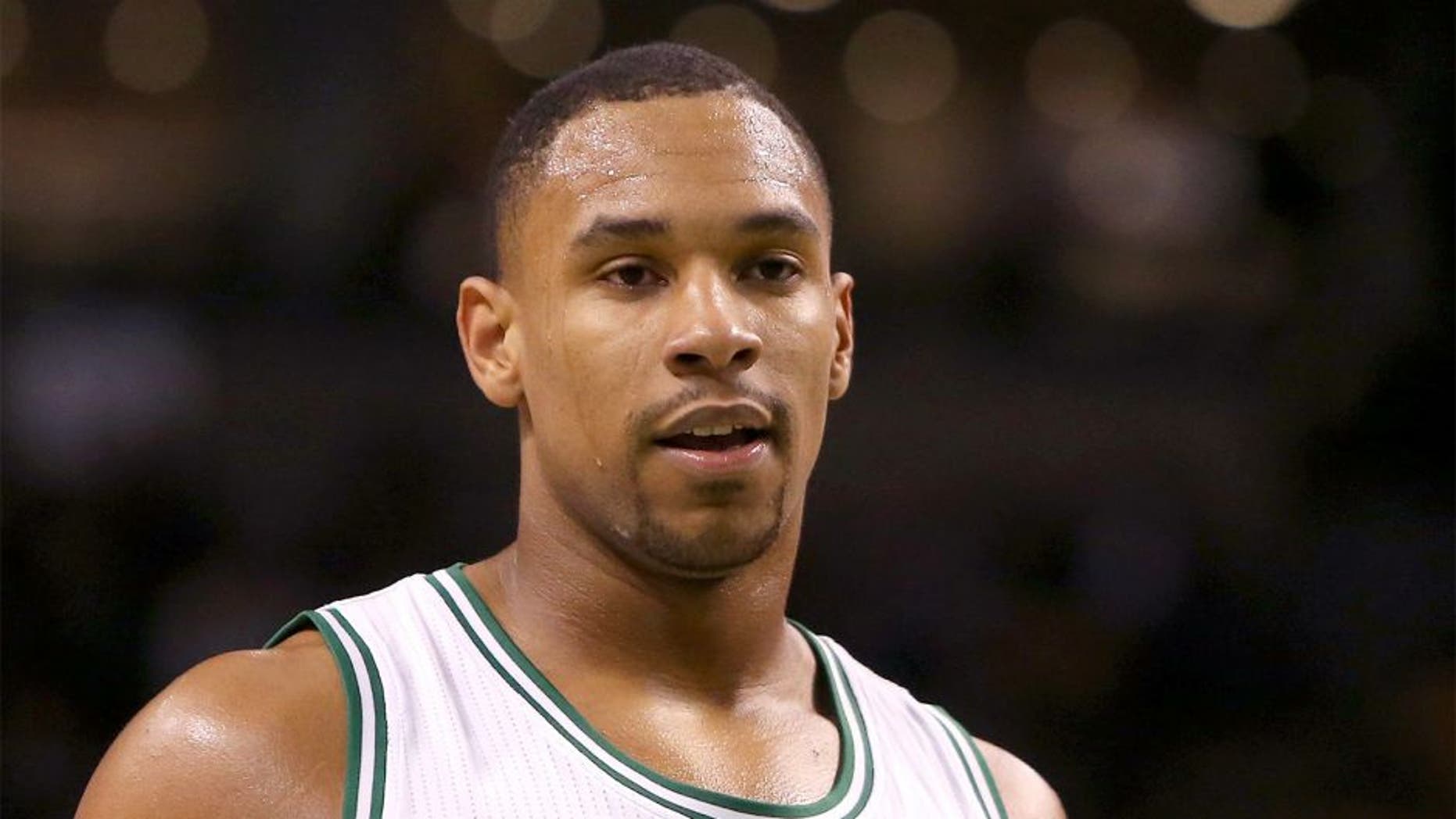 BOSTON, MA - NOVEMBER 05: Jared Sullinger #7 of the Boston Celtics looks on from the foul line against the Toronto Raptors at TD Garden on November 5, 2014 in Boston, Massachusetts. NOTE TO USER: User expressly acknowledges and agrees that, by downloading and or using this photograph, User is consenting to the terms and conditions of the Getty Images License Agreement. (Photo by Mike Lawrie/Getty Images)