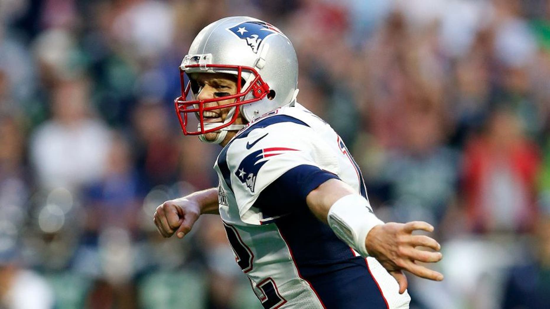 GLENDALE, AZ - FEBRUARY 01: Tom Brady #12 of the New England Patriots celebrates after a touchdown against the Seattle Seahawks in the second quarter during Super Bowl XLIX at University of Phoenix Stadium on February 1, 2015 in Glendale, Arizona. (Photo by Christian Petersen/Getty Images)