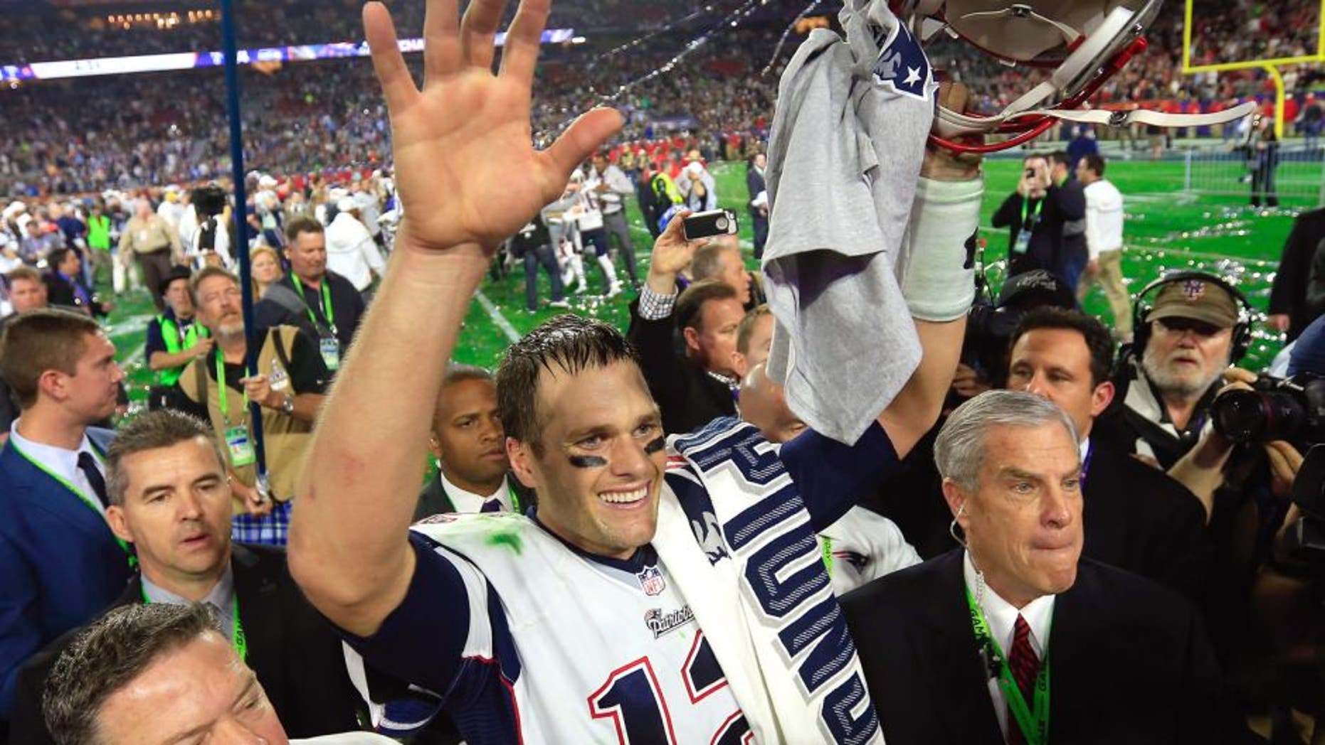 Tom Brady #12 of the New England Patriots celebrates after defeating the Seattle Seahawks during Super Bowl XLIX at University of Phoenix Stadium on February 1, 2015 in Glendale, Arizona. The Patriots defeated the Seahawks 28-24. (Photo by Rob Carr/Getty Images)