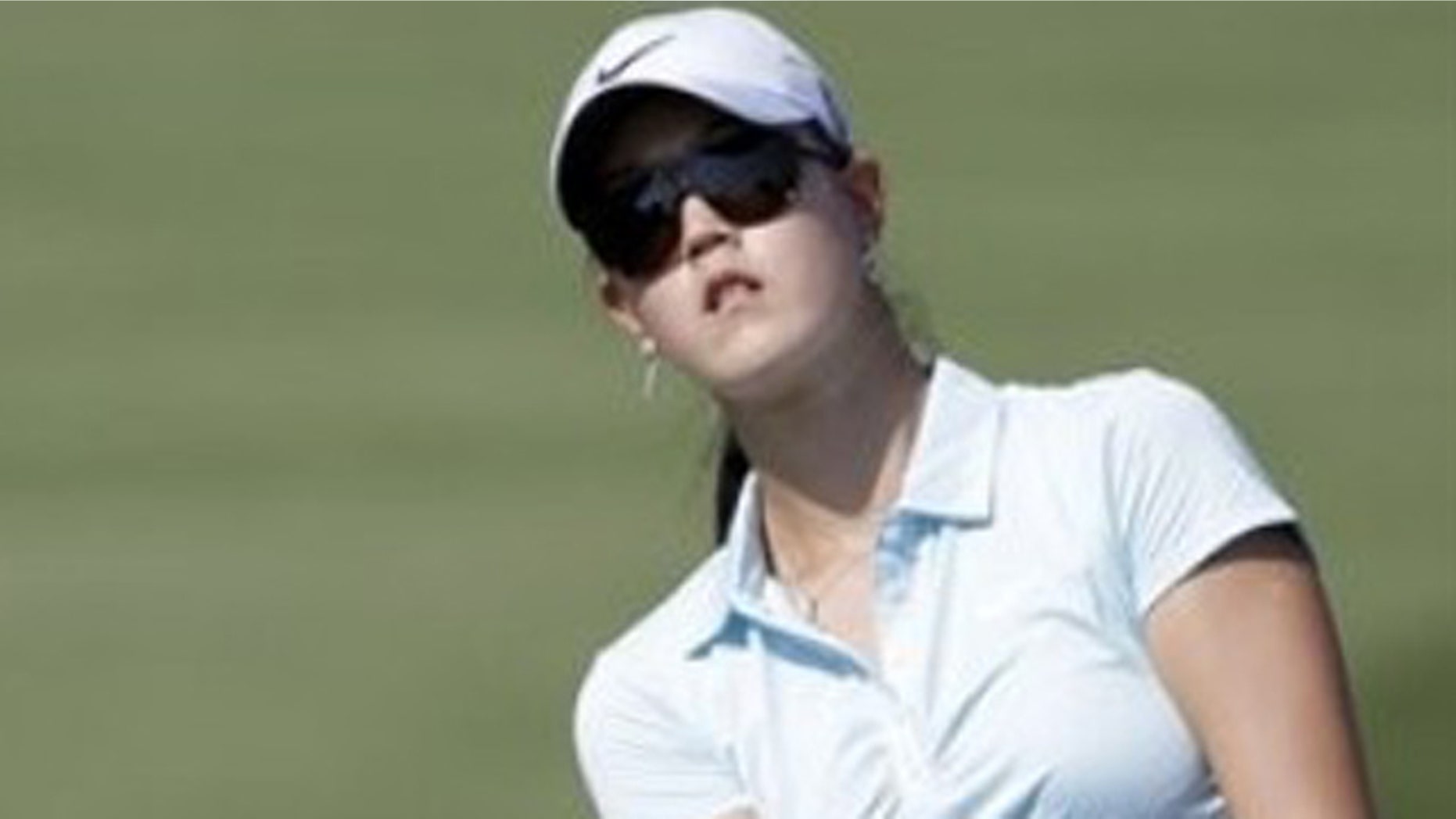 Michelle Wie follows her ball during the third round of the Omega Dubai Ladies Masters held at the Emirates Golf Club, Dubai, UAE, on Friday, Dec 10, 2010.