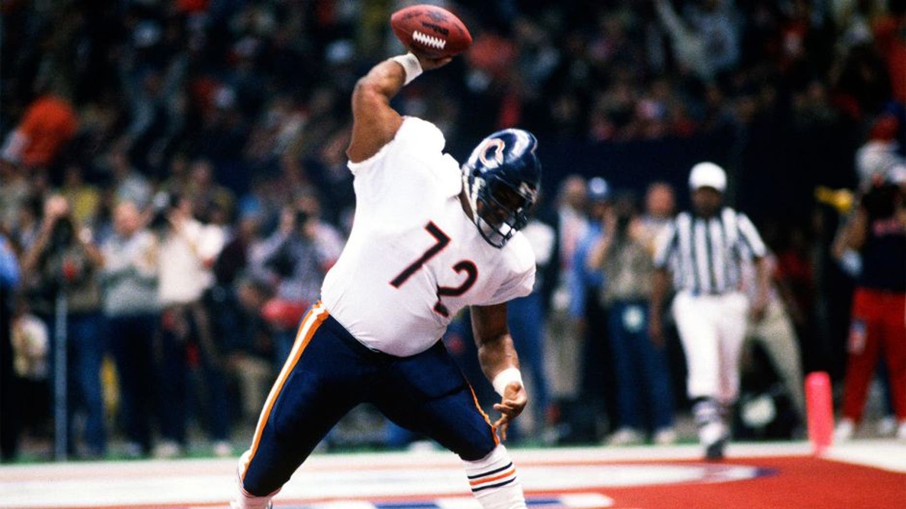 LOUISIANA, NO - JANUARY 26: William Perry #72 celebrates after scoring a touchdown against the New England Patriots during Superbowl XX at the Louisiana Superdome January 26, 1986 in New Orleans, Louisiana. The Bears won the Super Bowl 46-10. (Photo by Focus on Sport/Getty Images) *** Local Caption *** William Perry