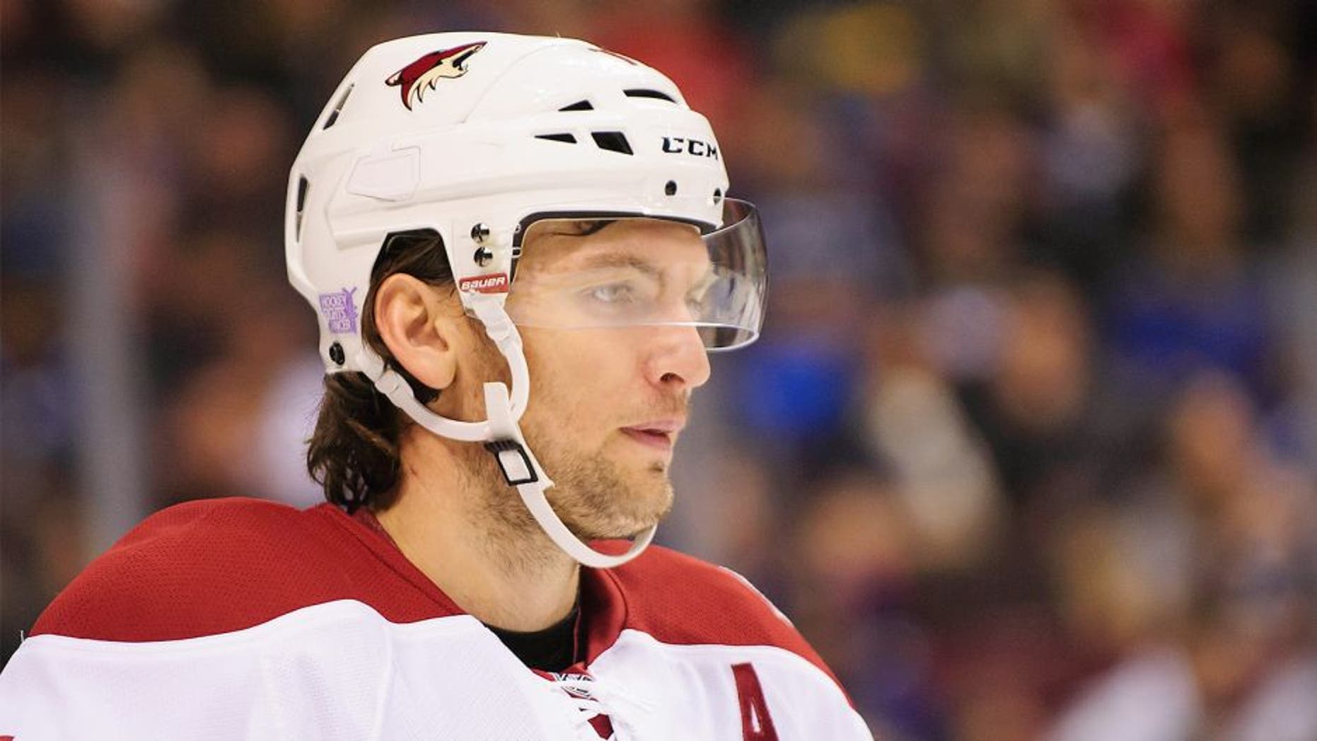 Nov 14, 2014; Vancouver, British Columbia, CAN; Arizona Coyotes forward Martin Hanzal (11) awaits start of the play against the Vancouver Canucks during the first period at Rogers Arena. The Arizona Coyotes won 5-0. Mandatory Credit: Anne-Marie Sorvin-USA TODAY Sports